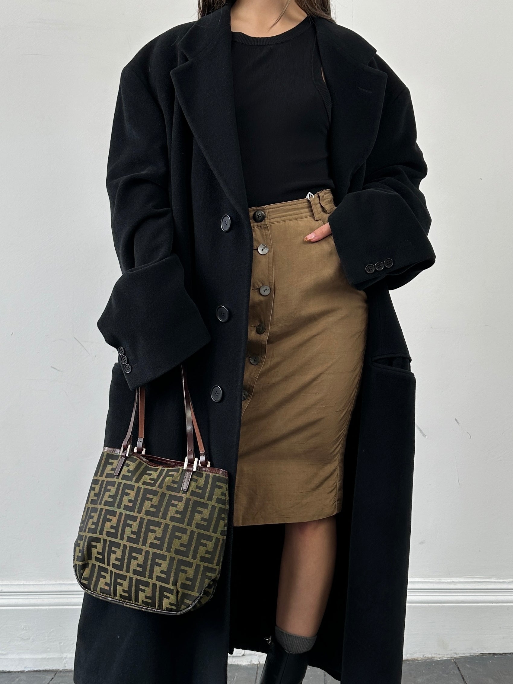 Jaeger pure silk button-down midi skirt in W24, featuring a sleek design and elegant silhouette.