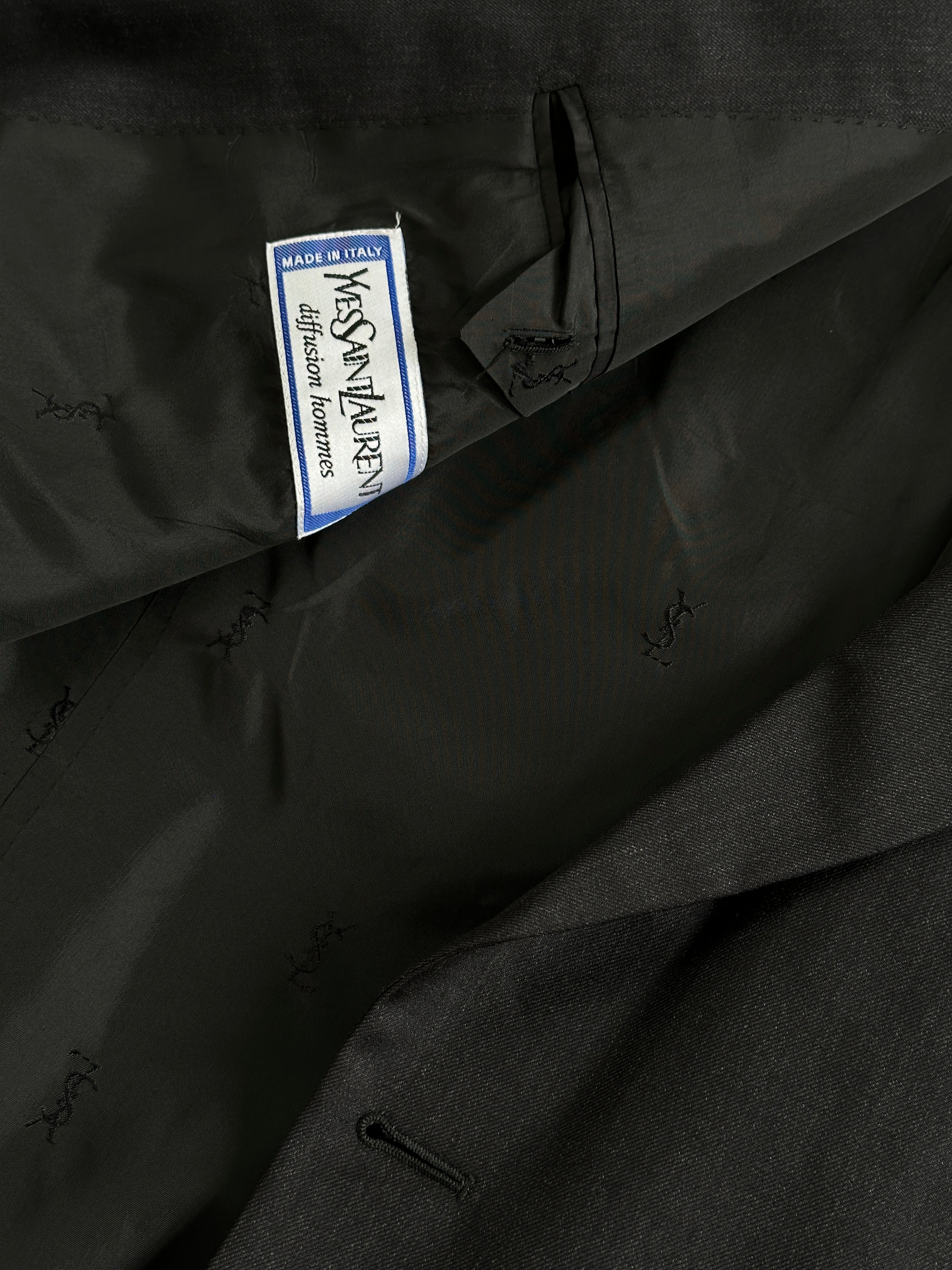 Yves Saint Laurent 80s wool double-breasted blazer in size 40R/L, featuring classic tailored design and structured lapels.
