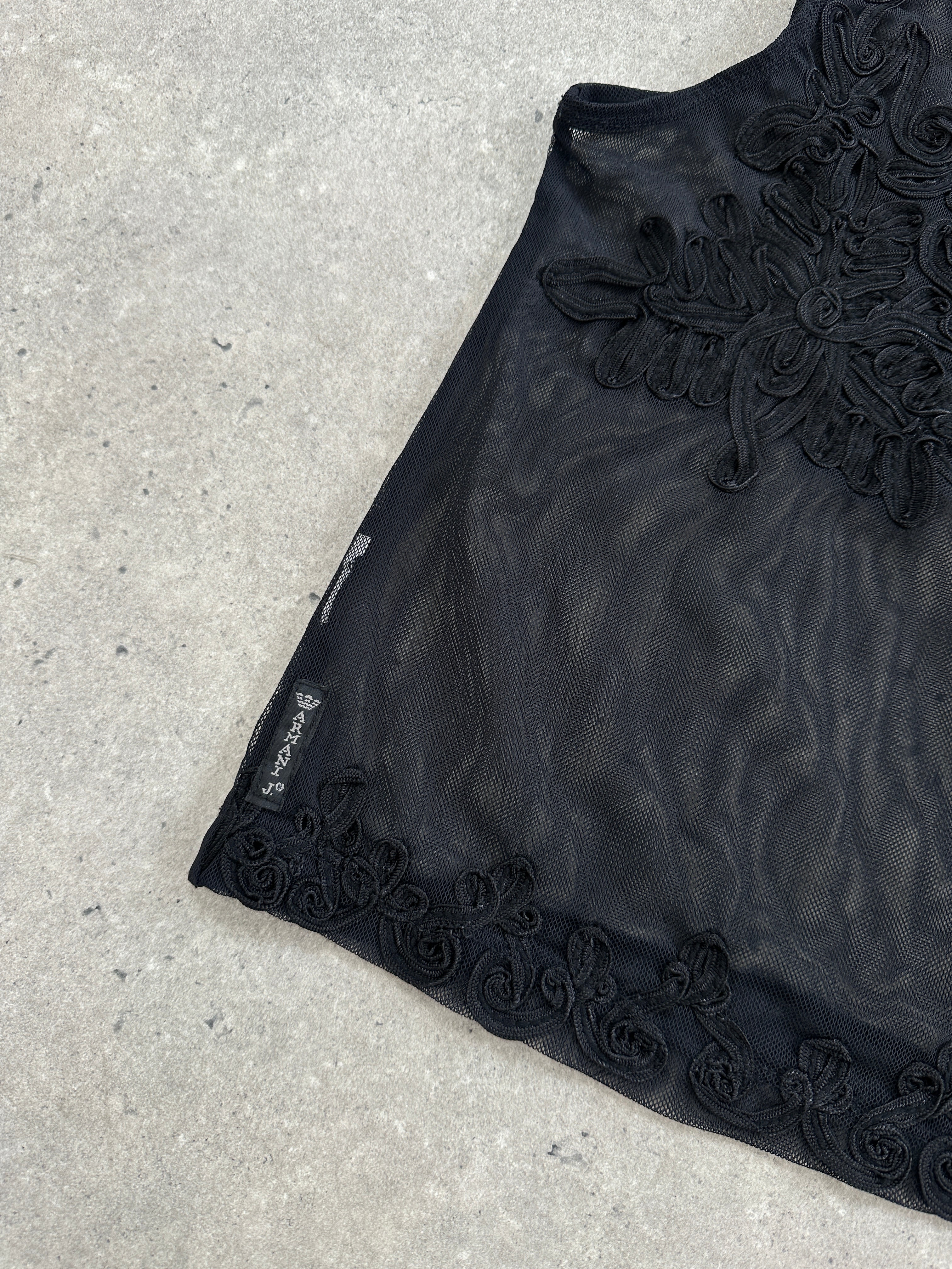 Armani Jeans sheer appliqué vest top in size S, featuring delicate fabric and stylish design, displayed on a mannequin.