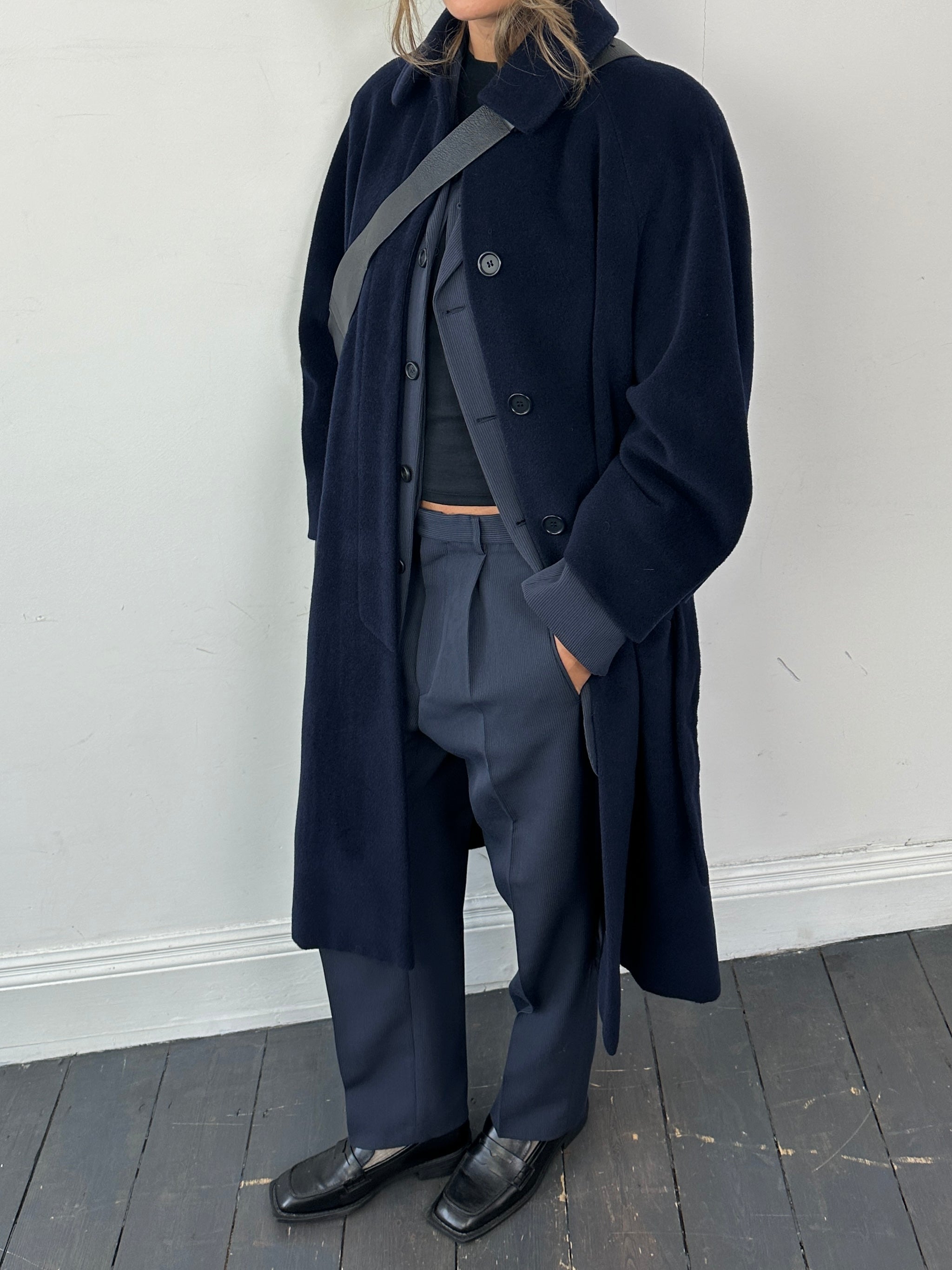 Vintage wool belted coat with concealed placket, single breasted design, in size large, stylish and warm for cold weather.