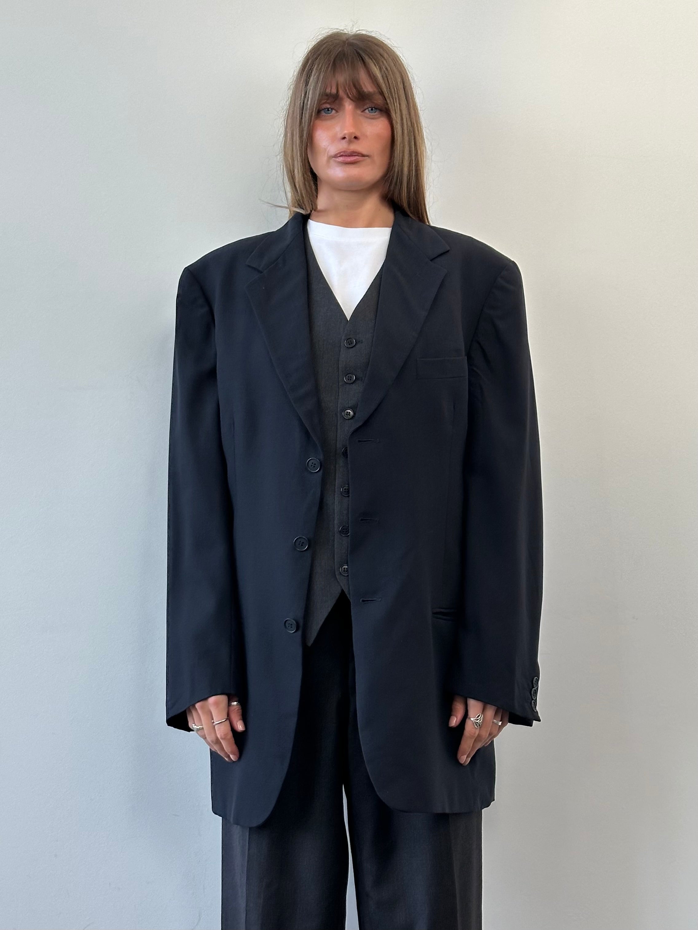 Emporio Armani pure wool single-breasted blazer in XL size, tailored fit with classic lapel and sleek design.