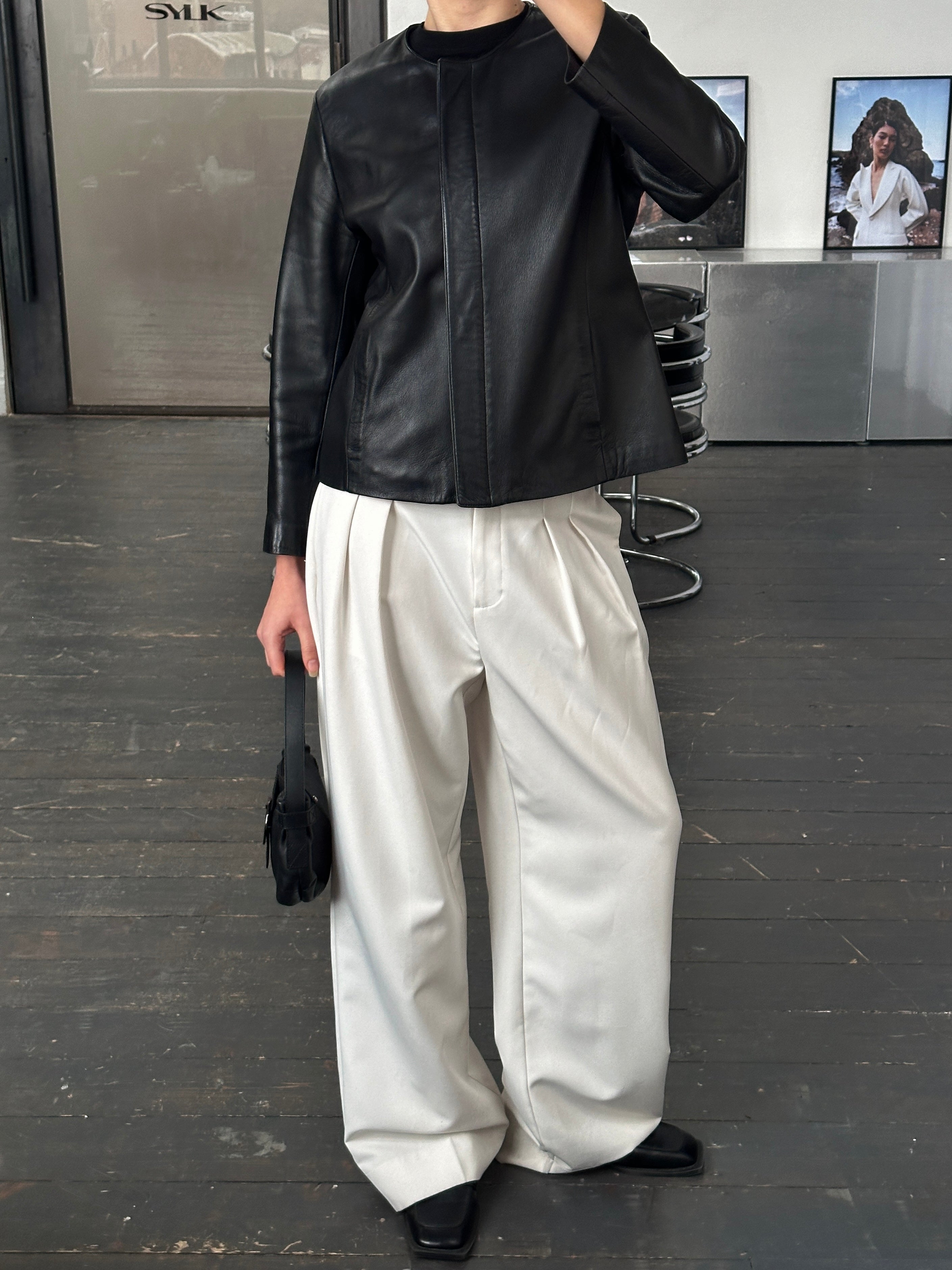 Vintage 1990s round neck leather jacket in minimal style, medium size, featuring smooth leather and classic design.