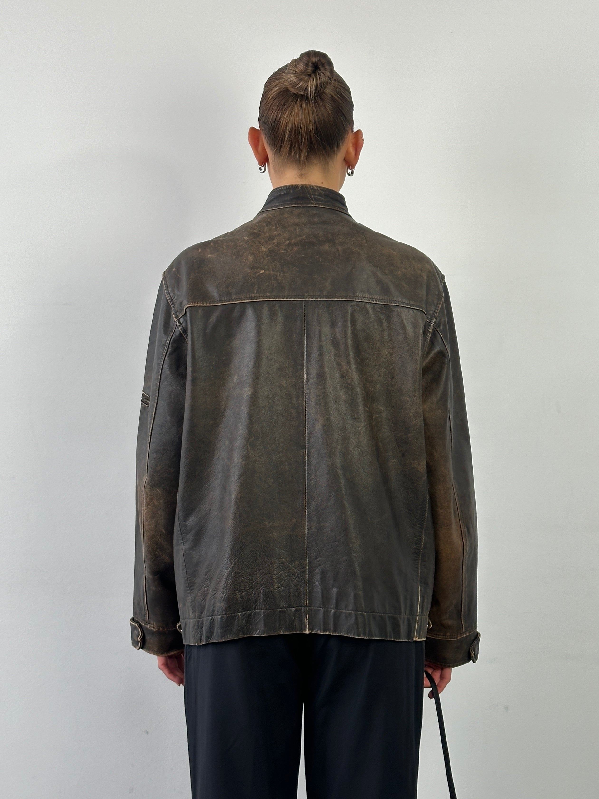 Vintage Moto aged leather jacket in size L, showcasing distressed brown leather with classic motorcycle style and detailed stitching.