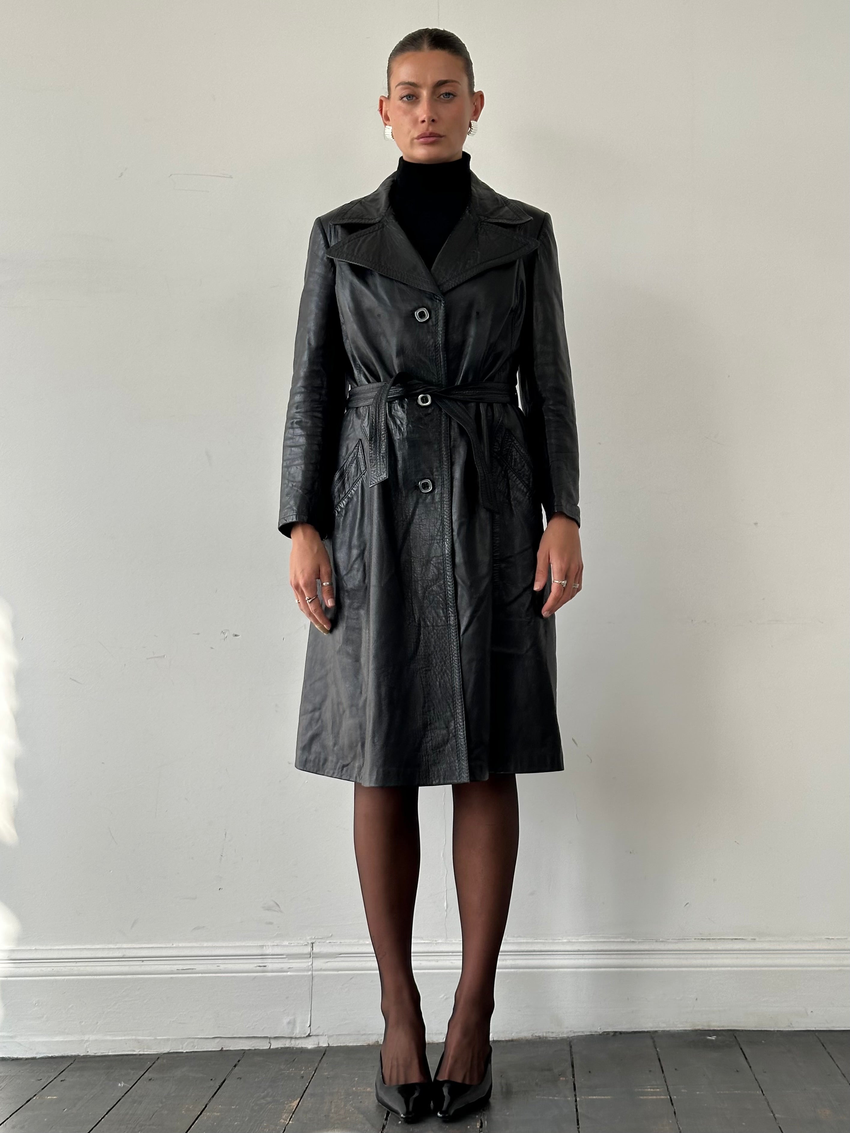 Vintage Italian leather belted trench coat in size M, stylish and timeless outerwear with classic design details.