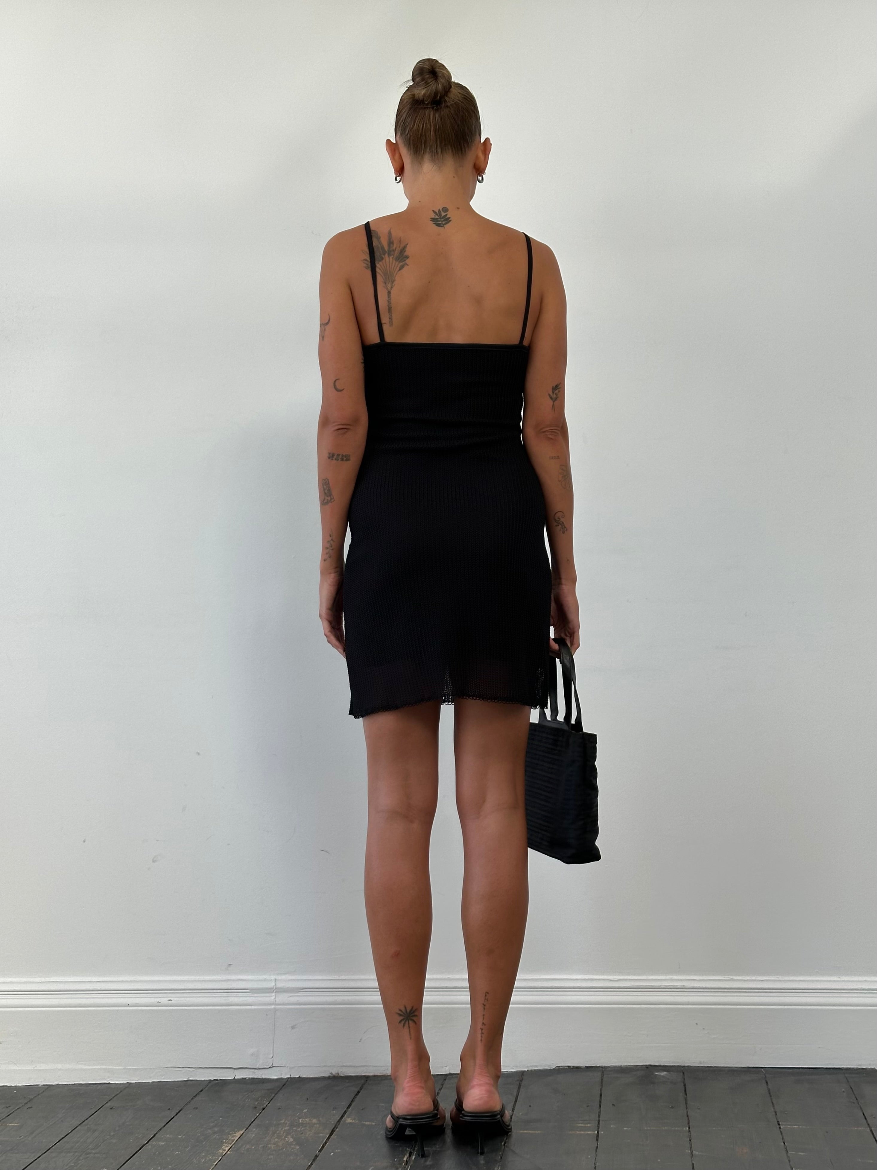 Vintage French vintage double layered mini slip dress in size S, featuring lightweight fabric and delicate design.