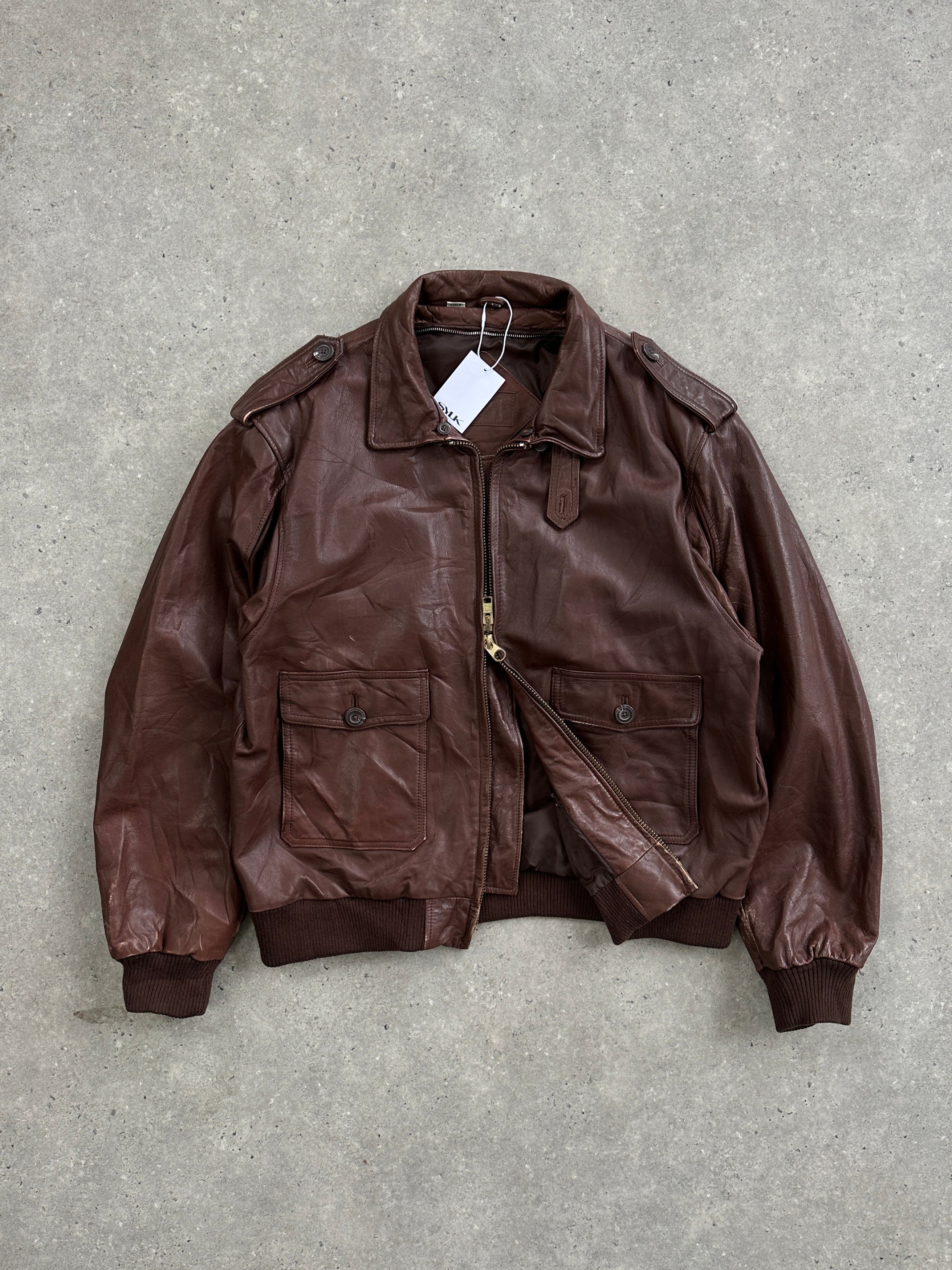 Vintage double zip leather bomber jacket in XL, featuring classic design, leather material, and stylish details.