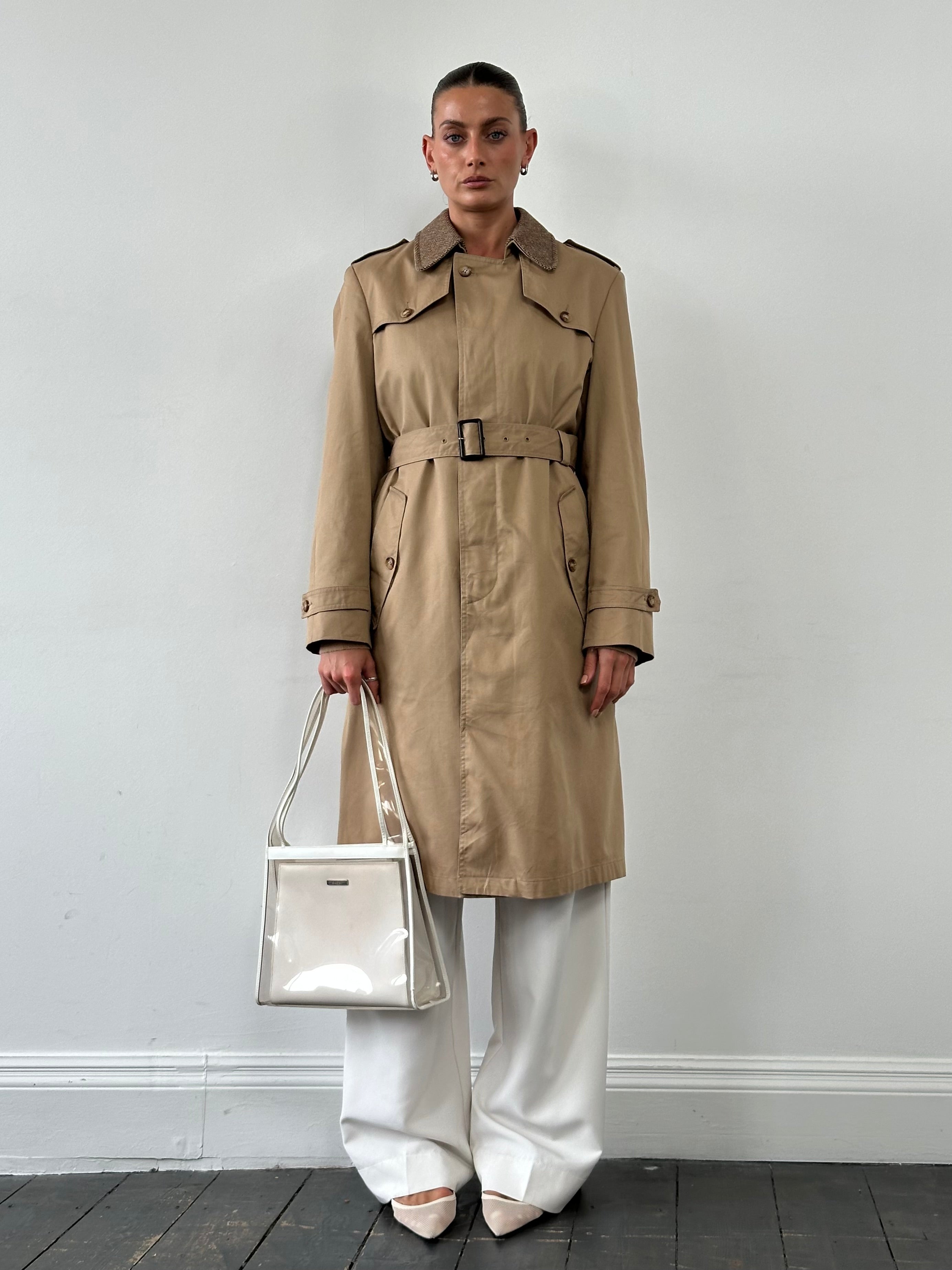 Christian Dior Monsieur cotton belted trench coat, single-breasted design in neutral fabric, displayed on a hanger.