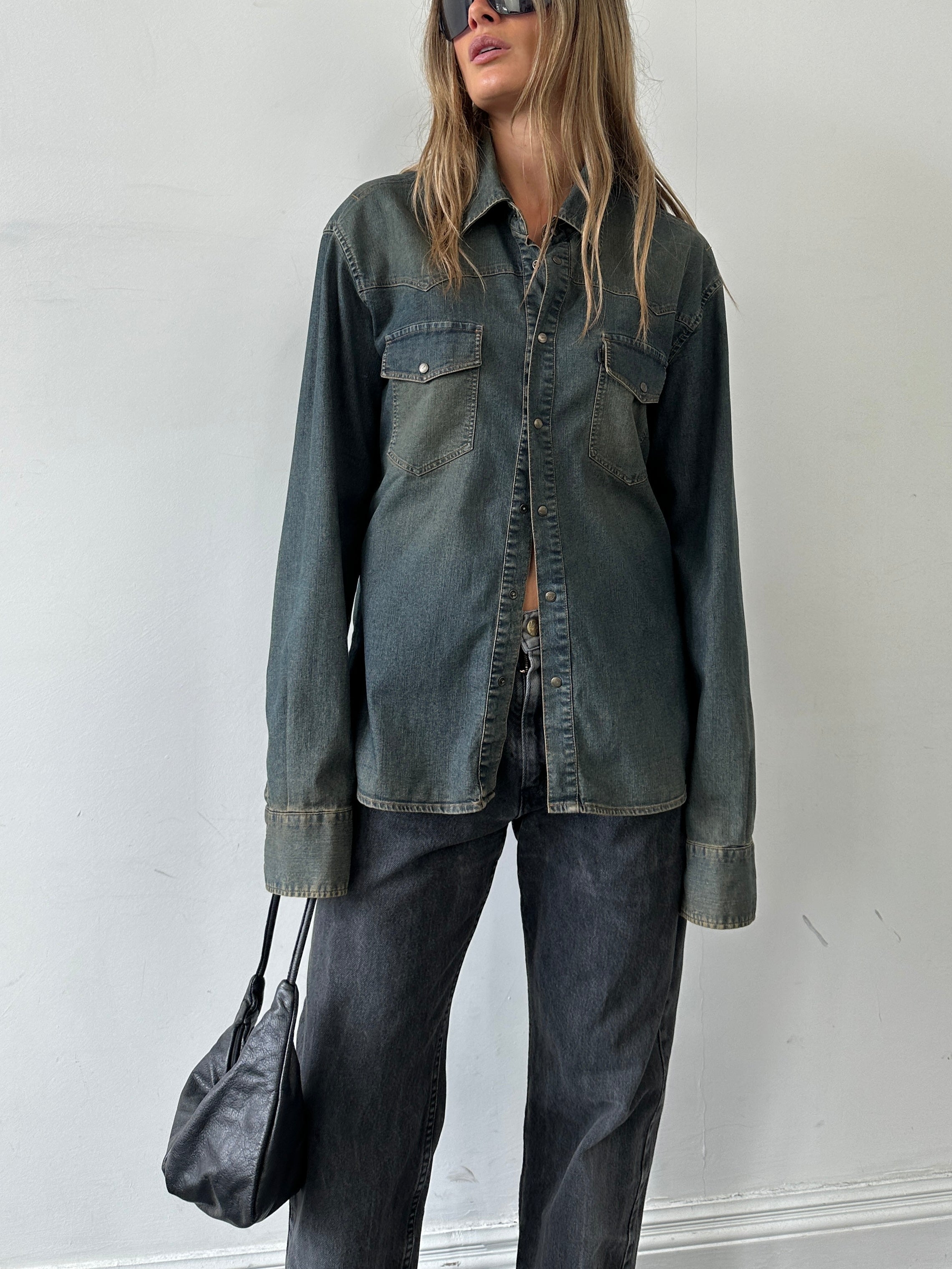 Roberto Cavalli Just Cavalli faded denim shirt in size large, featuring a casual button-up design and signature denim texture.