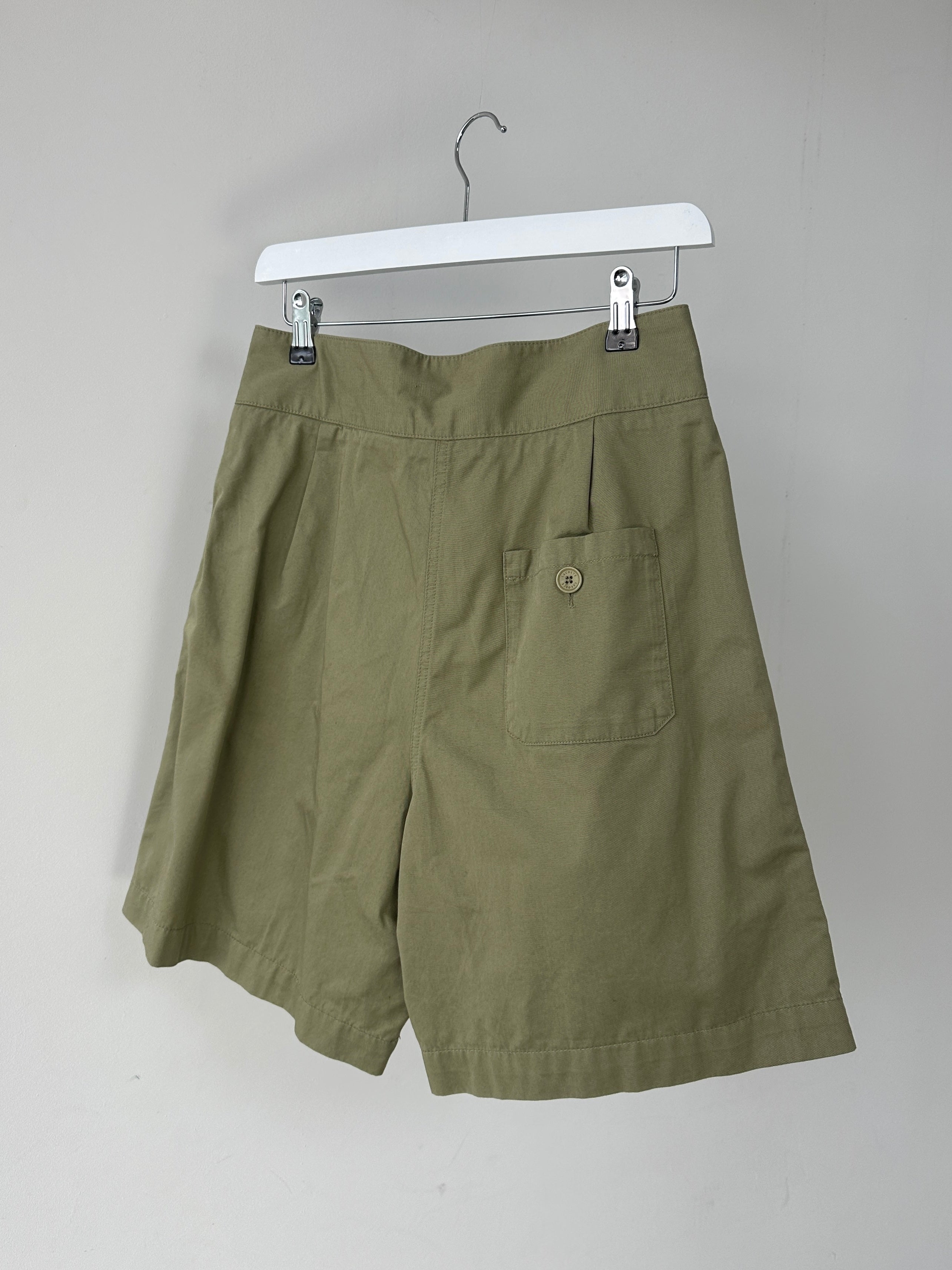 Lacoste high waisted cotton shorts in white, size W28, featuring classic Lacoste branding and a comfortable fit.
