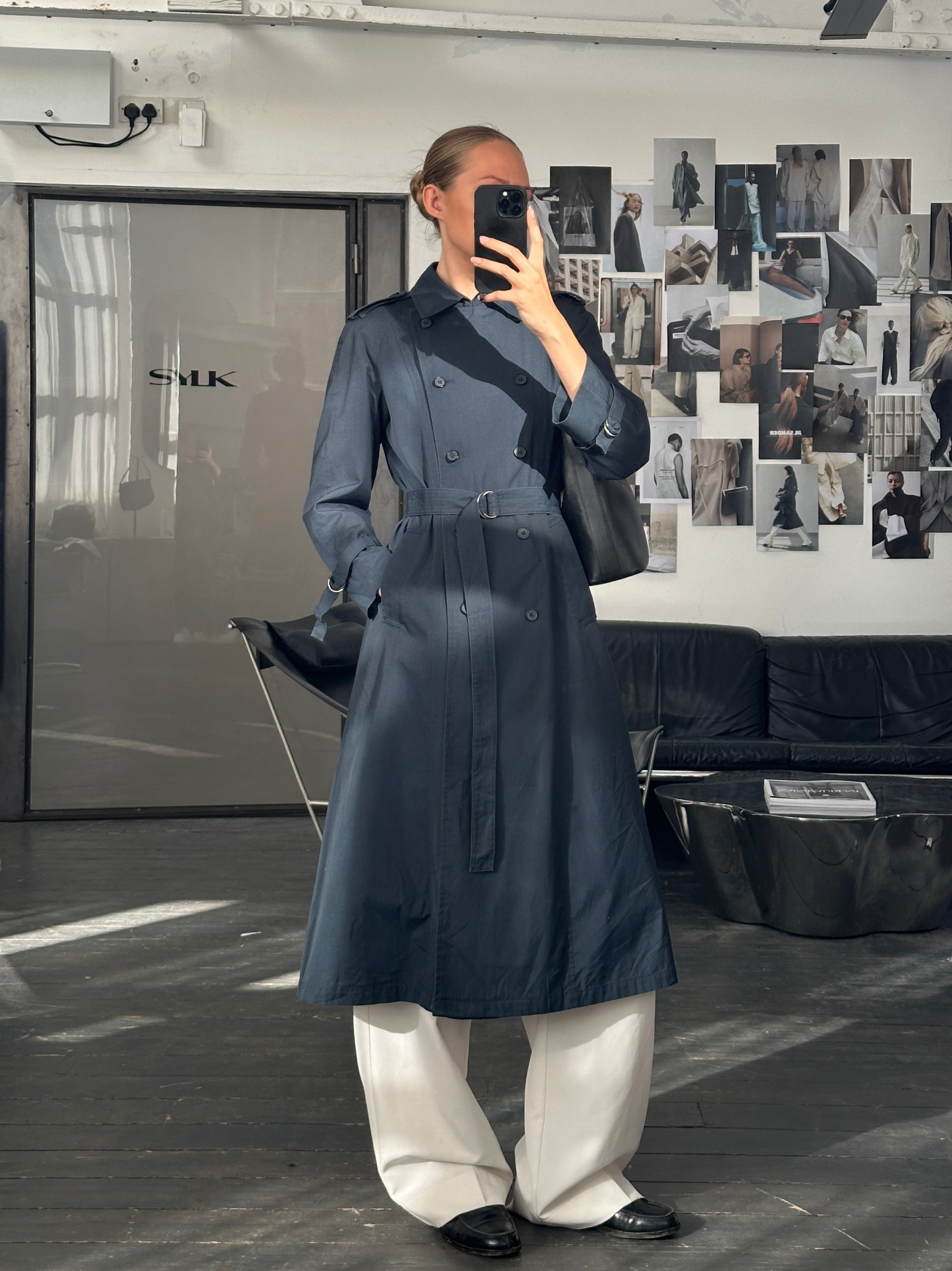 London Fog 1980s double-breasted cotton trench coat, size small, shown on a hanger with classic beige color and tailored fit.