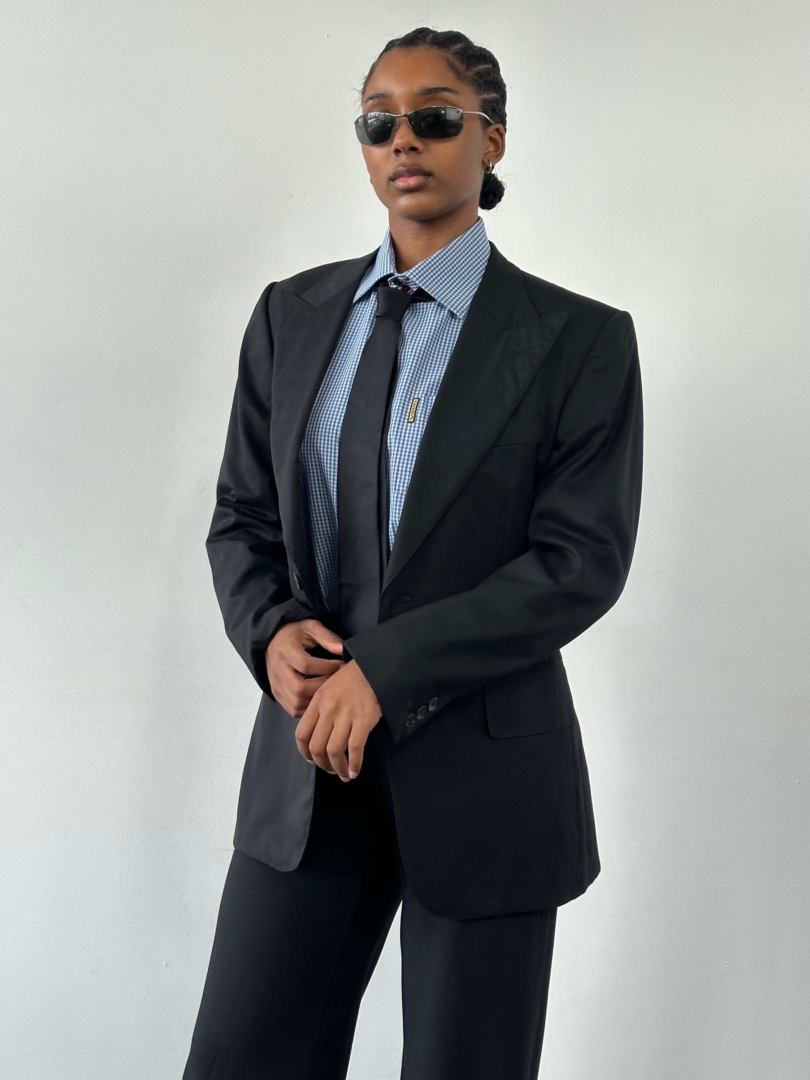 Gucci 1990s pure wool dagger collar blazer in size 38R/M, featuring structured design and classic dark color.