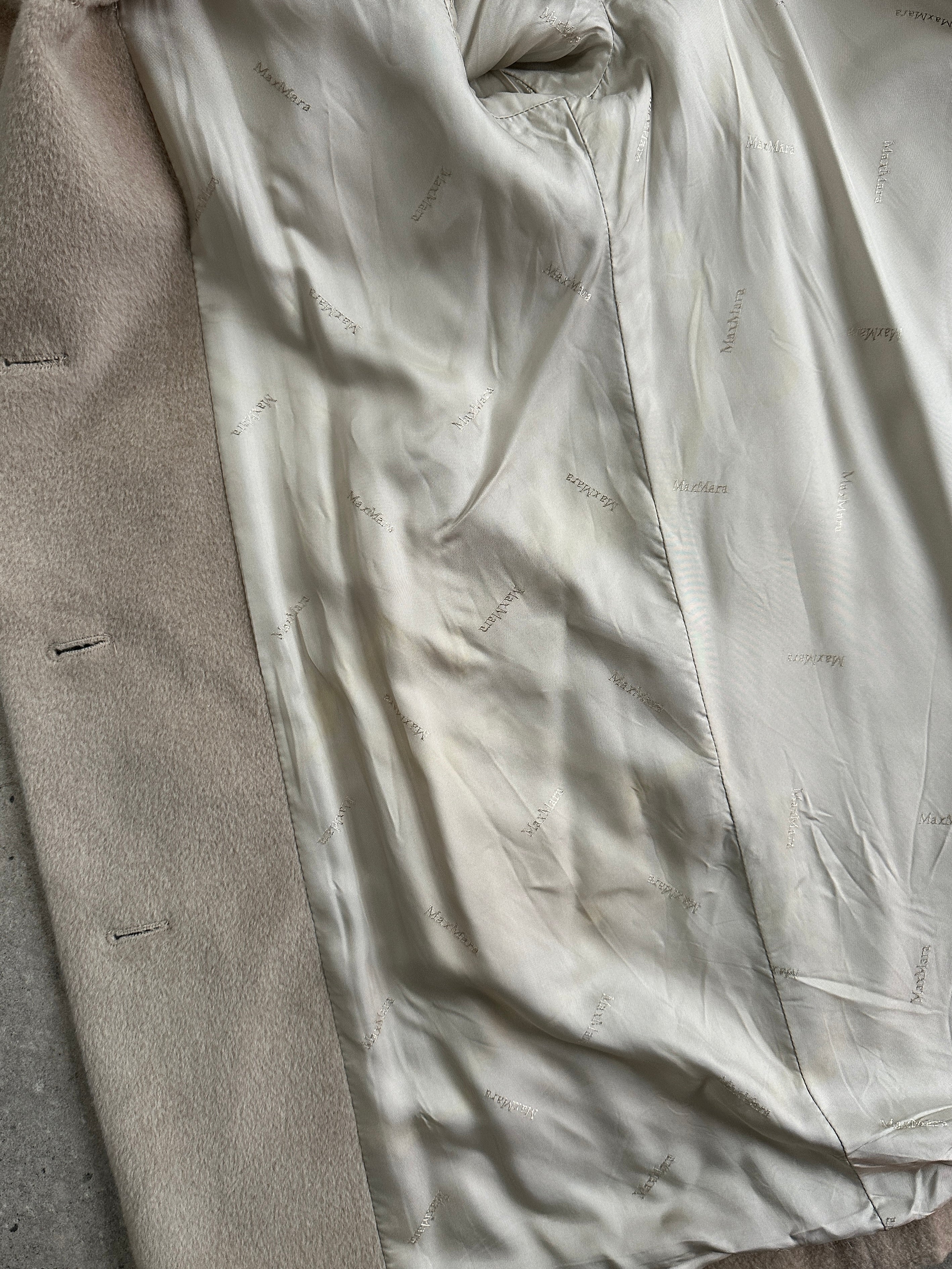 Max Mara brushed wool and cashmere single-breasted coat in M/L size, shown in a stylish, neutral-colored design.