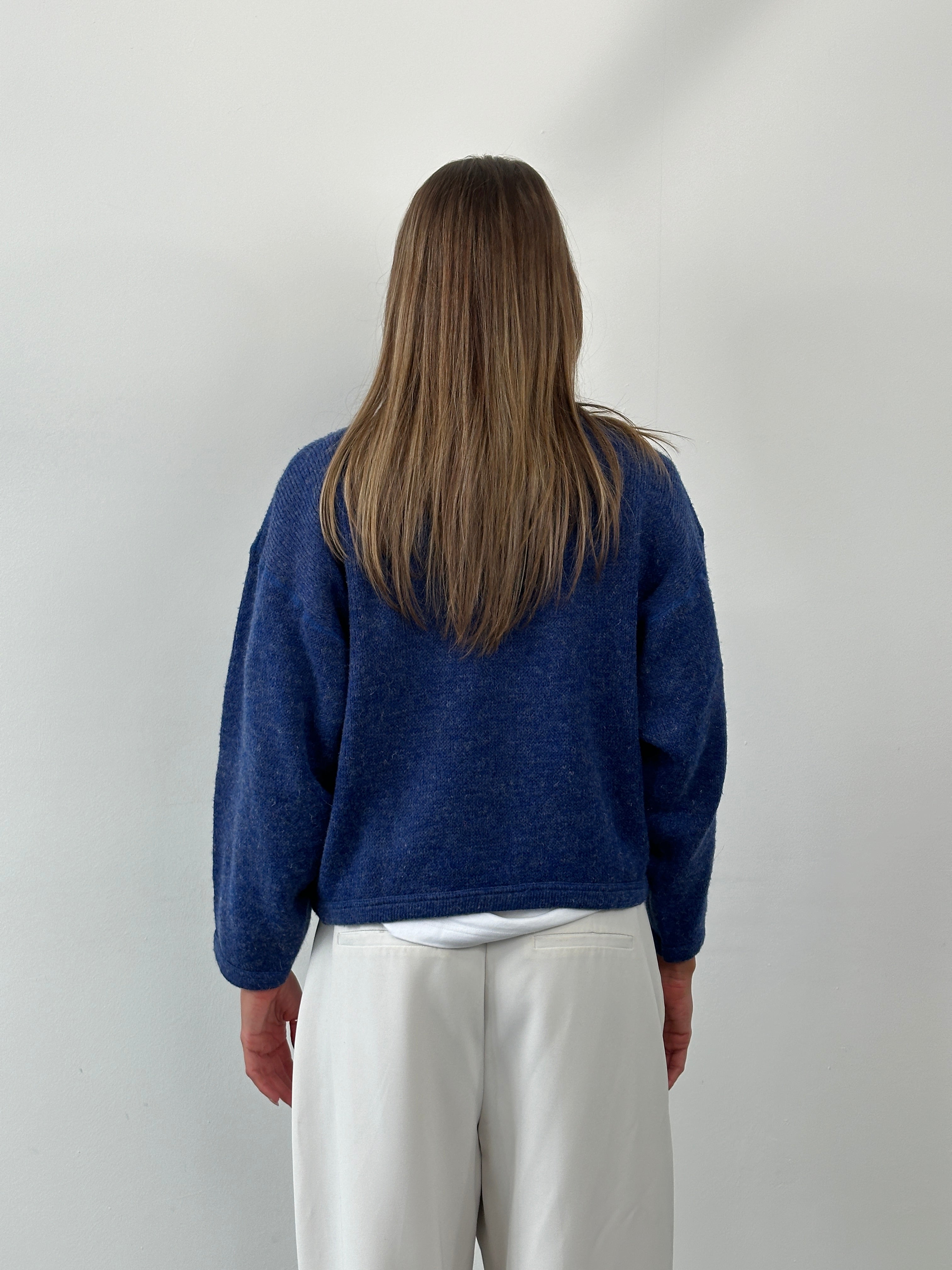 Valentino 1990s wool logo cropped knitted jumper in beige, featuring a classic design and brand logo on the front.