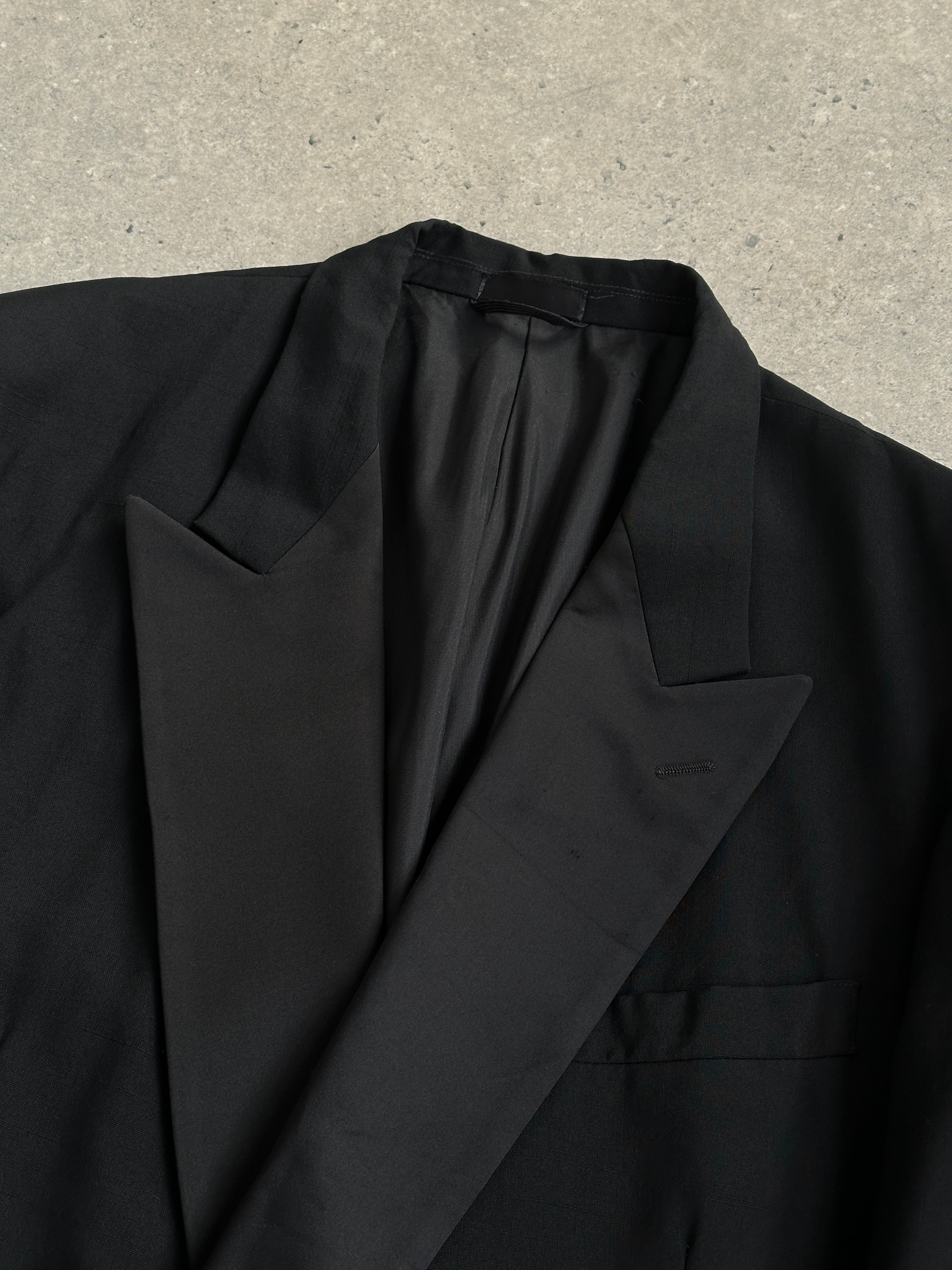 Yves Saint Laurent Pour Homme 1980s wool double-breasted tuxedo blazer in size 44S/XL, featuring classic tailoring and dark fabric.