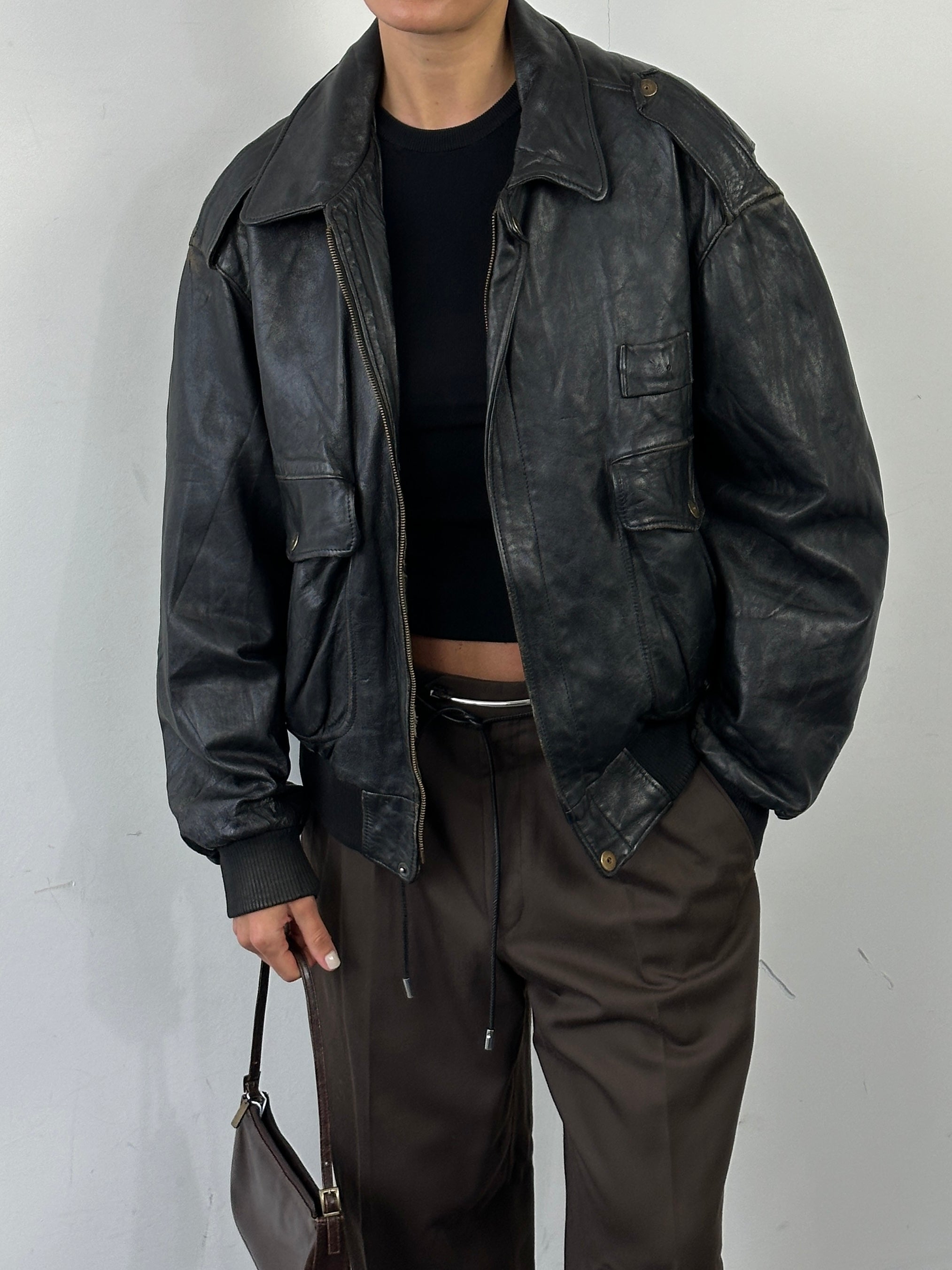 Vintage Italian leather bomber jacket with removable fleece lining, size large, stylish and warm men's outerwear.