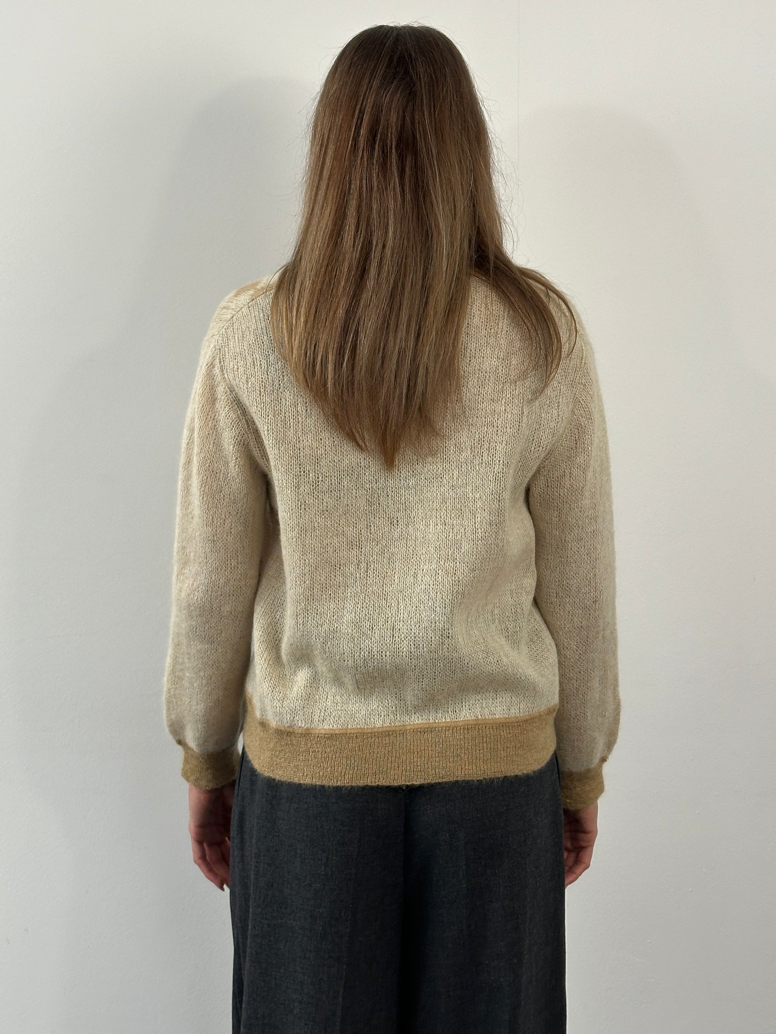 Vintage Italian 1980s mohair cardigan in S/M with a classic knit pattern and soft, textured fabric.