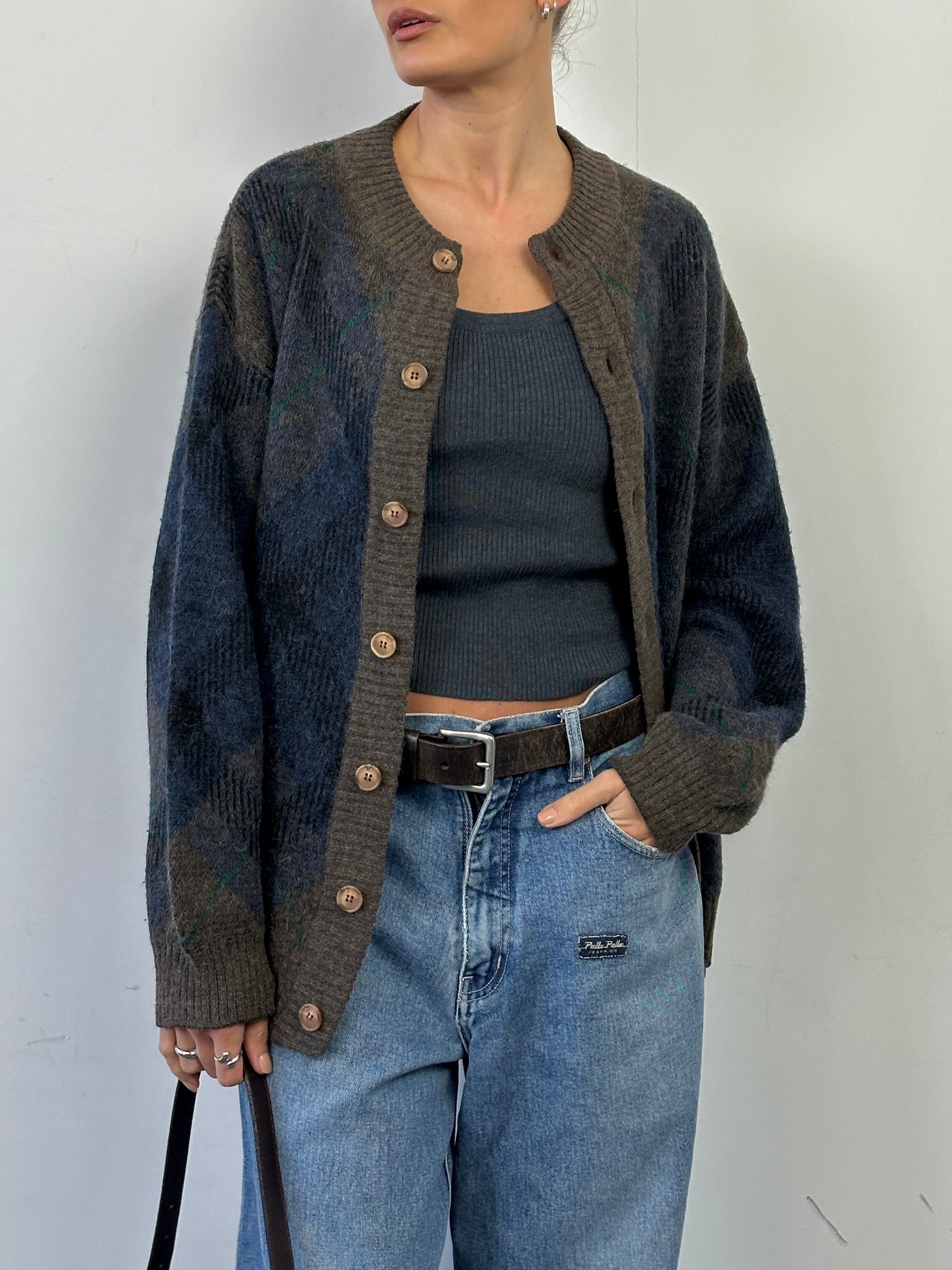 Vintage Italian alpaca wool print cardigan in size L/XL, featuring a cozy, vintage-inspired design with colorful patterns and textured fabric.