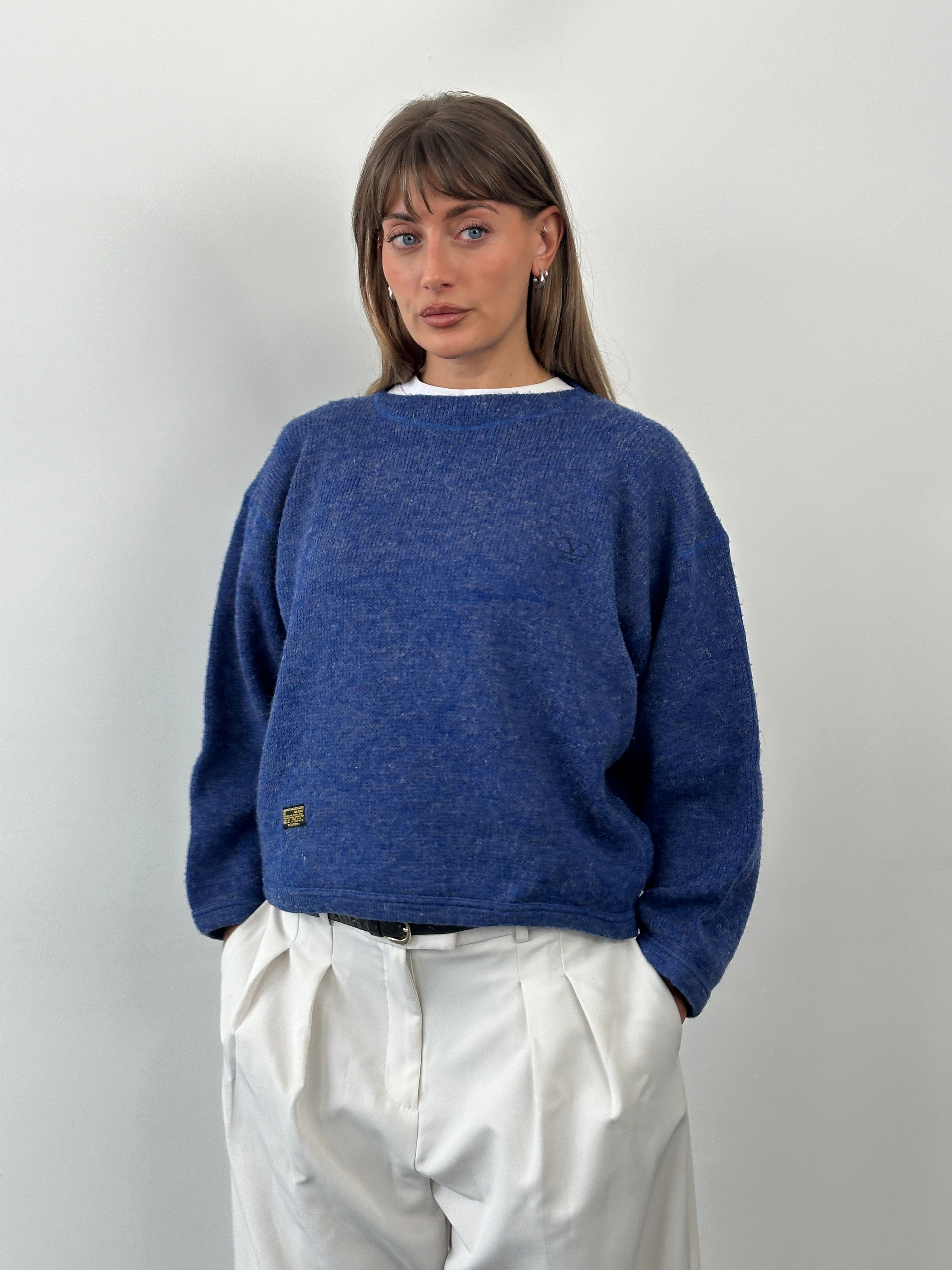 Valentino 1990s wool logo cropped knitted jumper in beige, featuring a vintage style with Valentino branding and ribbed cuffs.