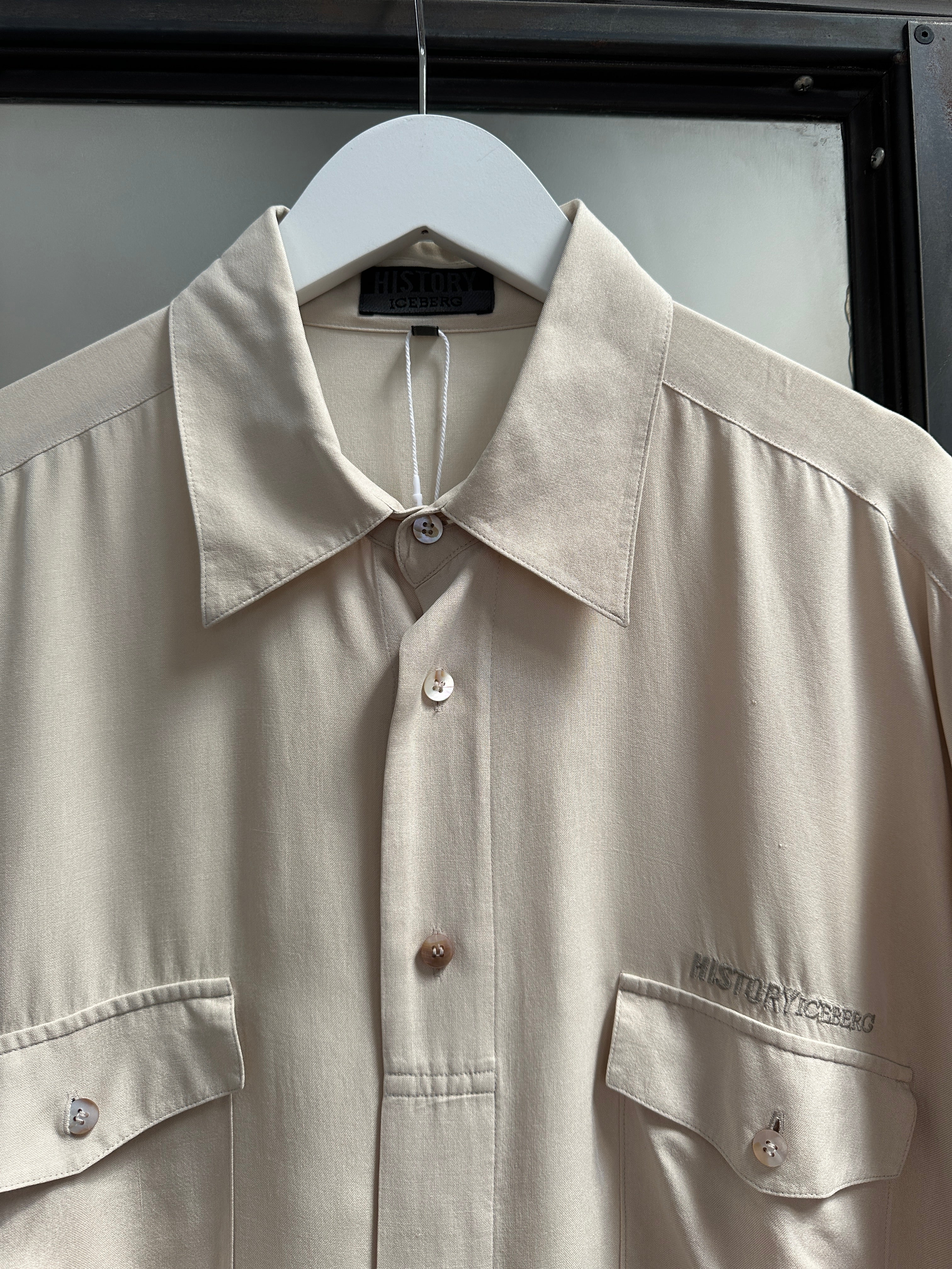 Iceberg 90s pure silk short sleeve shirt in XL, featuring a sleek, lightweight fabric and classic design, displayed on a neutral background.