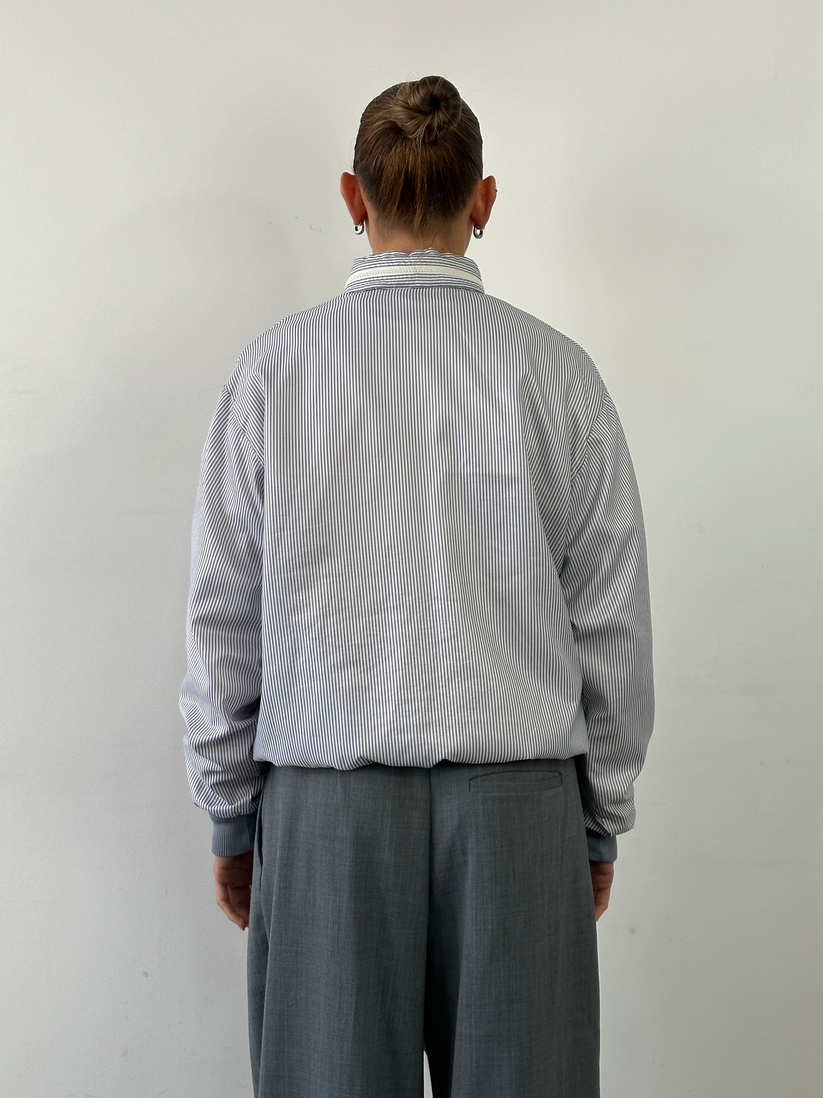 Lacoste 80s Stripe Tracksuit Jacket in size L, featuring classic striped design and casual sporty style.