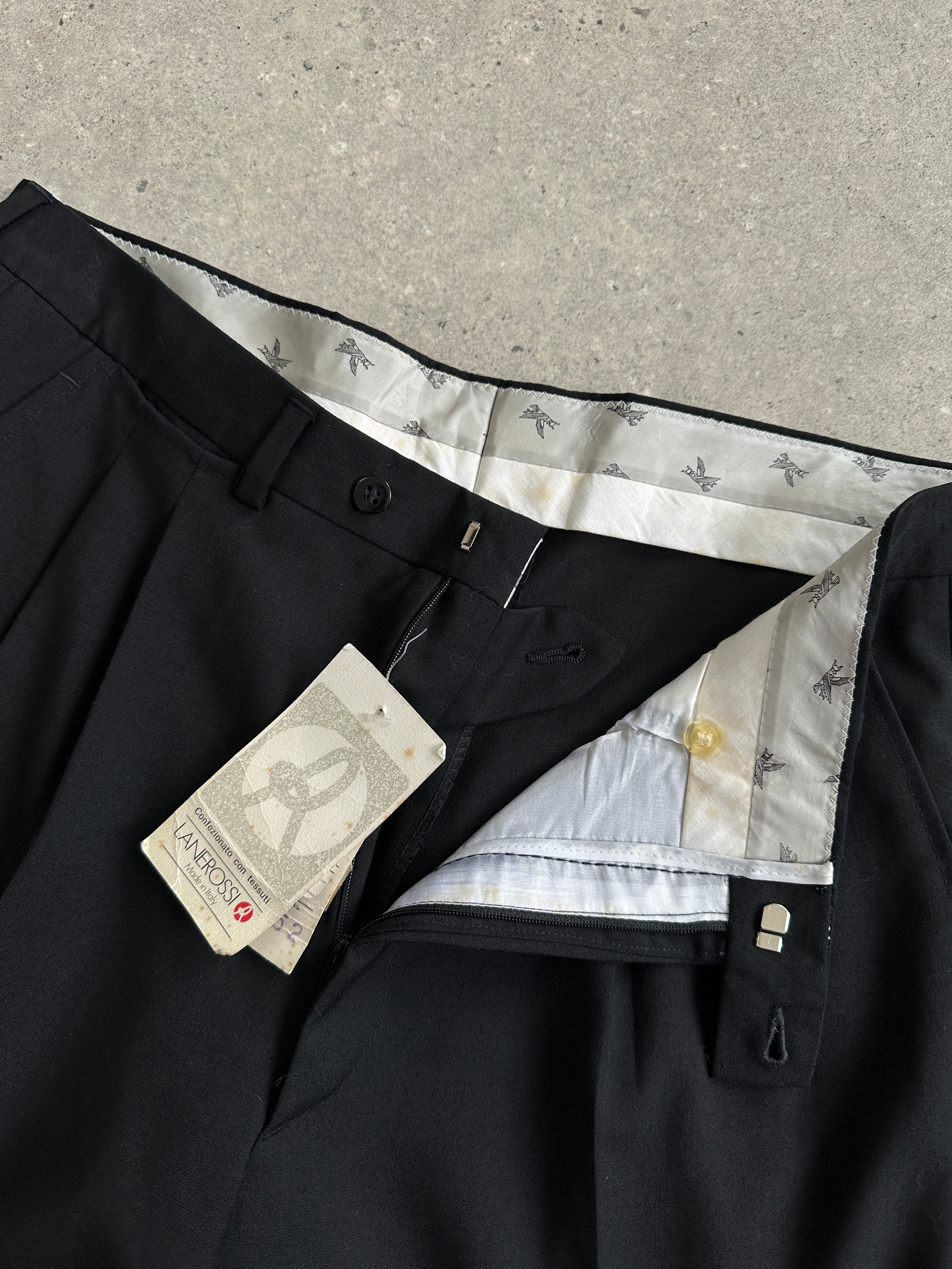Vintage Italian vintage pure wool straight leg trousers with raw hem, tailored fit, in size W34, displayed on a neutral background.