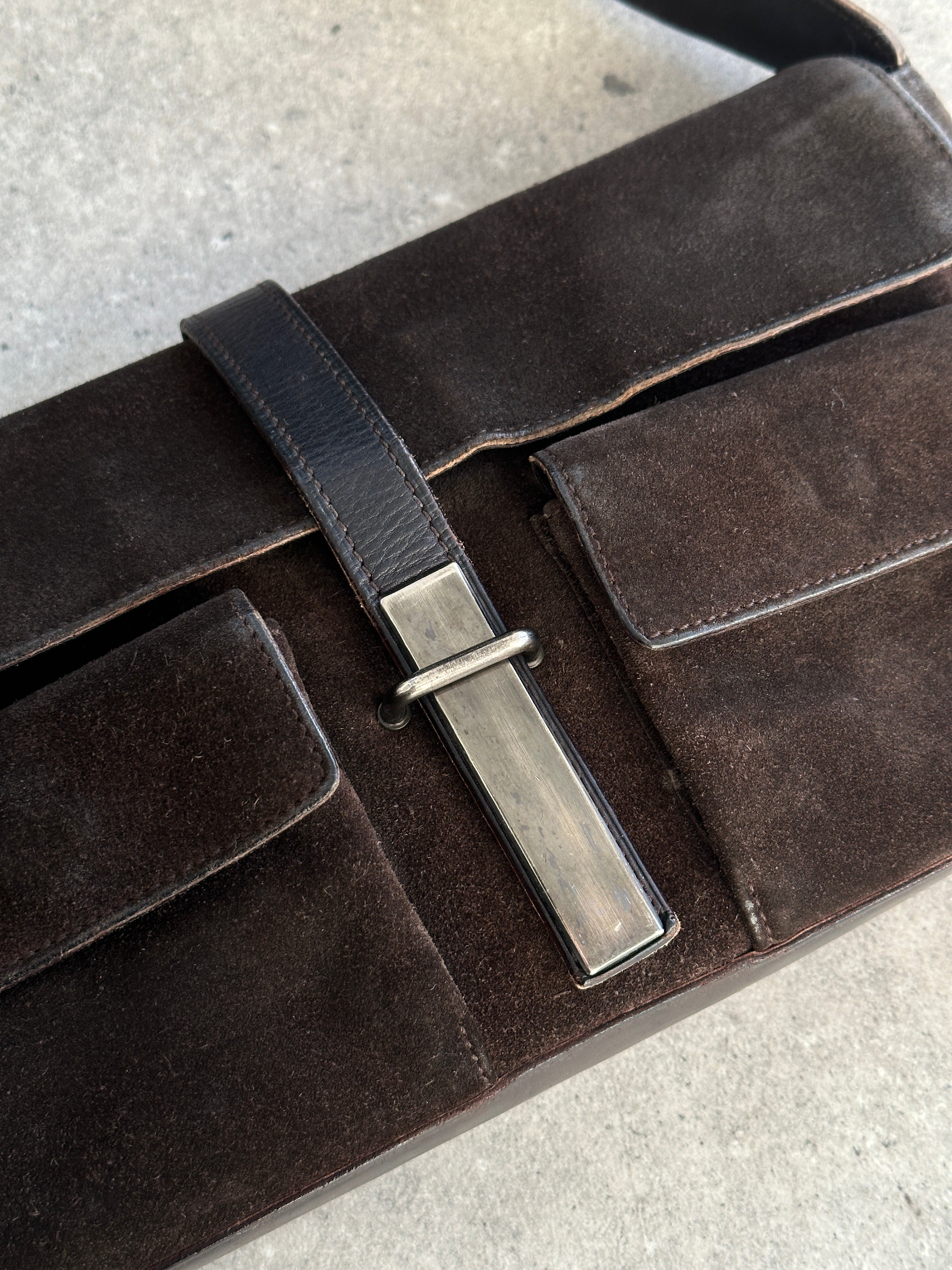 Yves Saint Laurent Rive Gauche 2000s suede shoulder bag with top handle and classic design, featuring a sleek, stylish look.