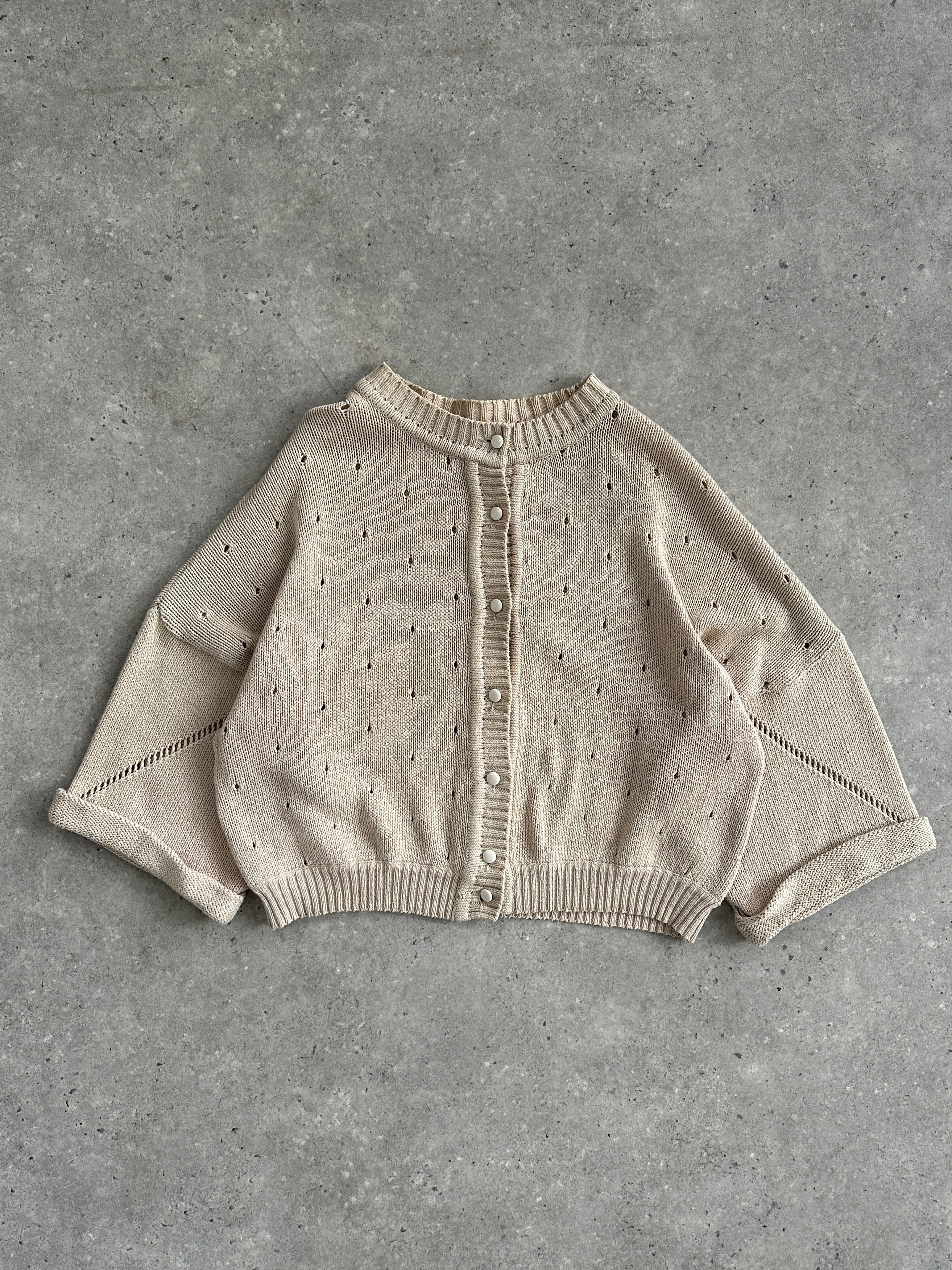 Vintage Italian vintage pure cotton cardigan in size M, featuring classic knit texture and button-front design.
