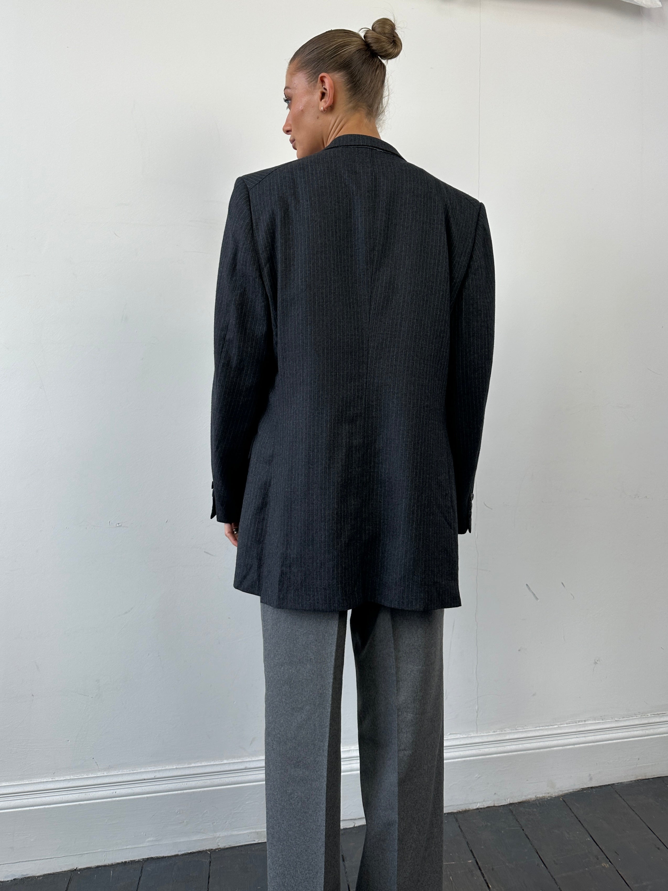 Givenchy pinstripe pure wool single-breasted blazer in size L/XL, tailored fit with classic lapel and button closure.