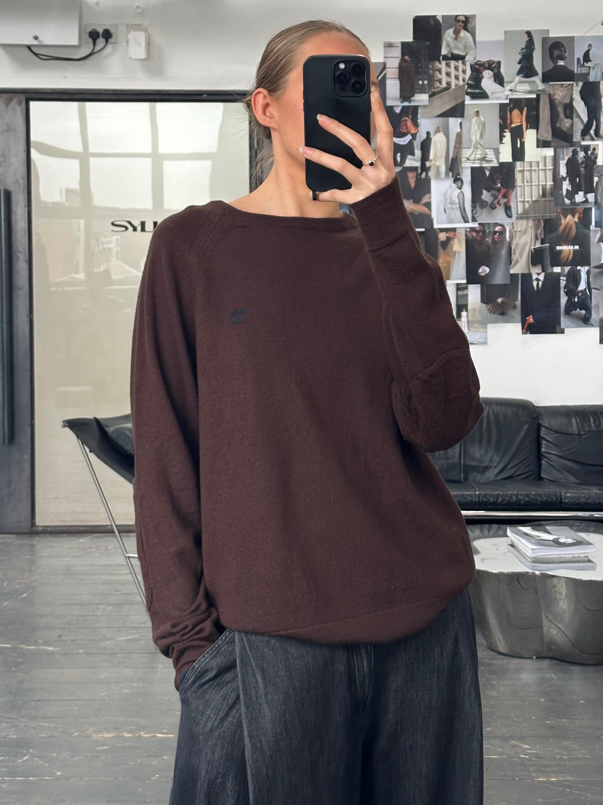 Timberland 2000s pure wool knitted logo jumper in M/L displayed on a model, featuring a cozy, textured design and Timberland branding.