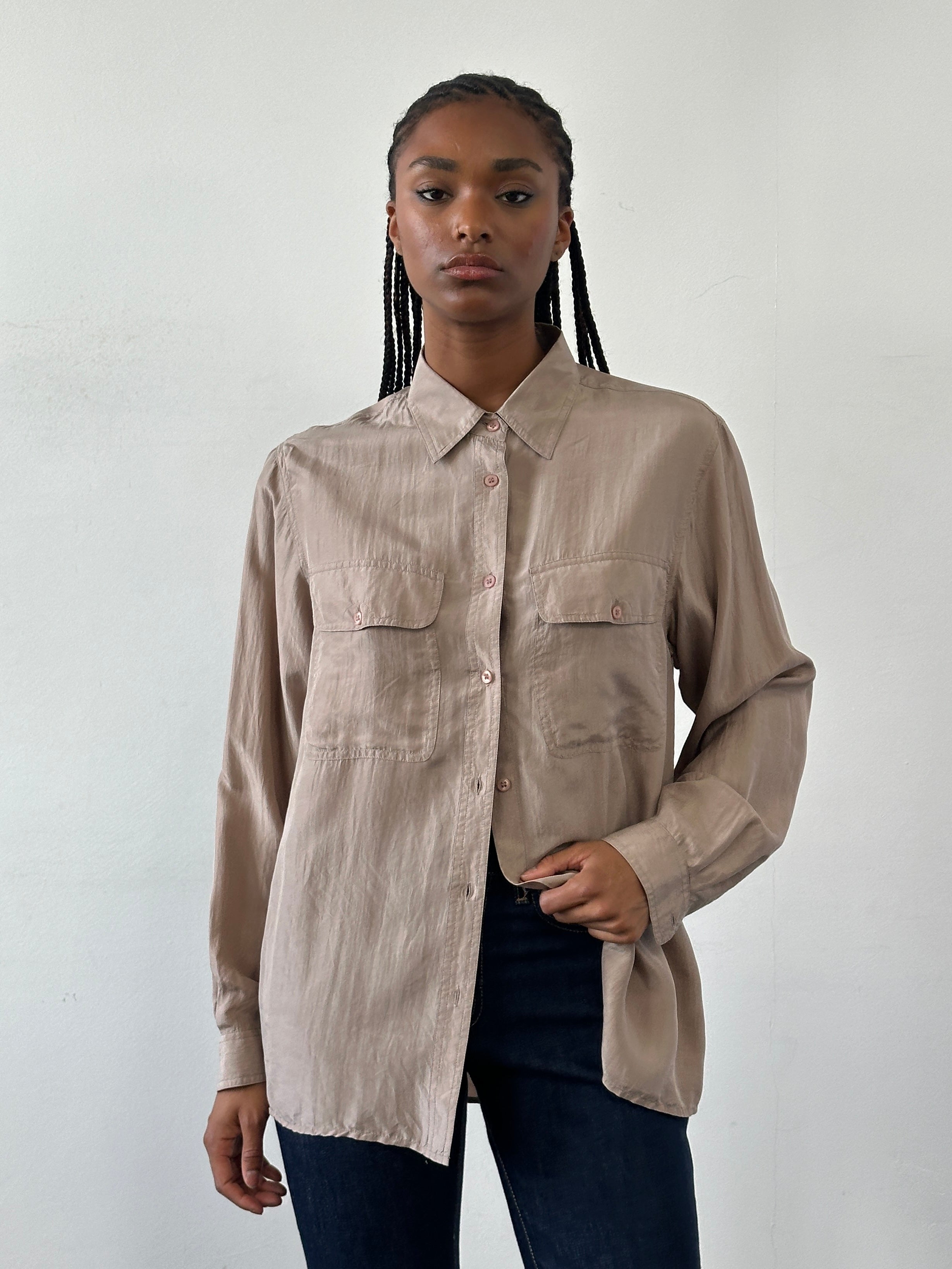 Vintage 1990s pure silk shirt in size M/L with a classic design, featuring smooth fabric and elegant detailing.