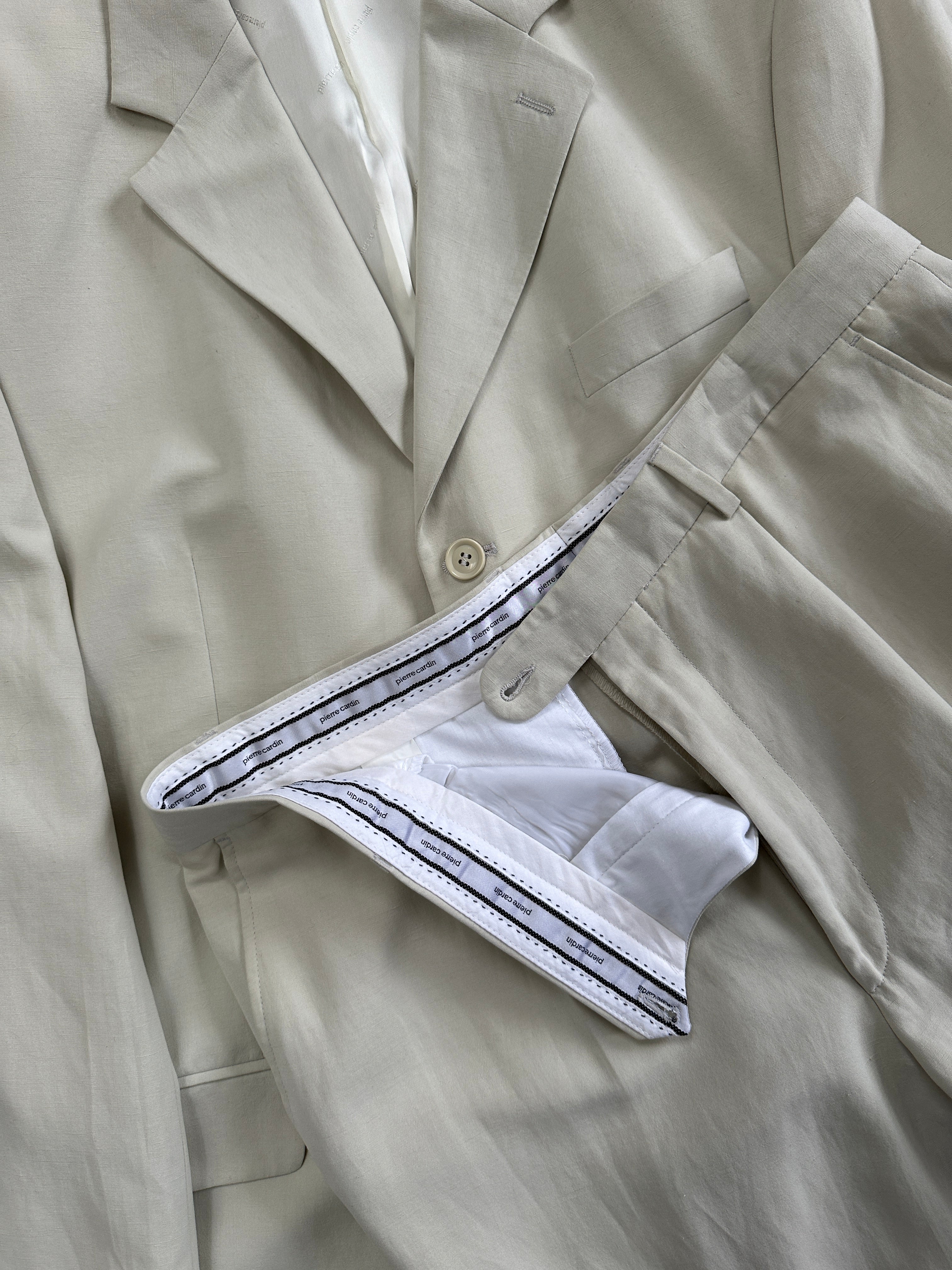 Pierre Cardin linen Tencel single-breasted jumpsuit in size 42L/W34, featuring a sleek, tailored fit and classic design.