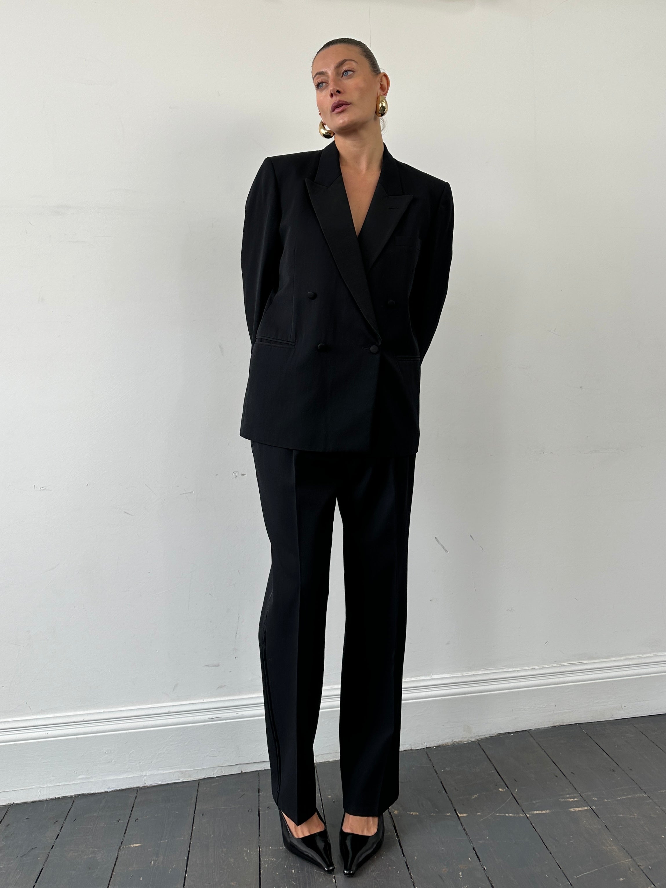 Christian Dior Monsieur tuxedo double-breasted suit jumpsuit in size 42S/W34, tailored with classic black fabric and sleek design.