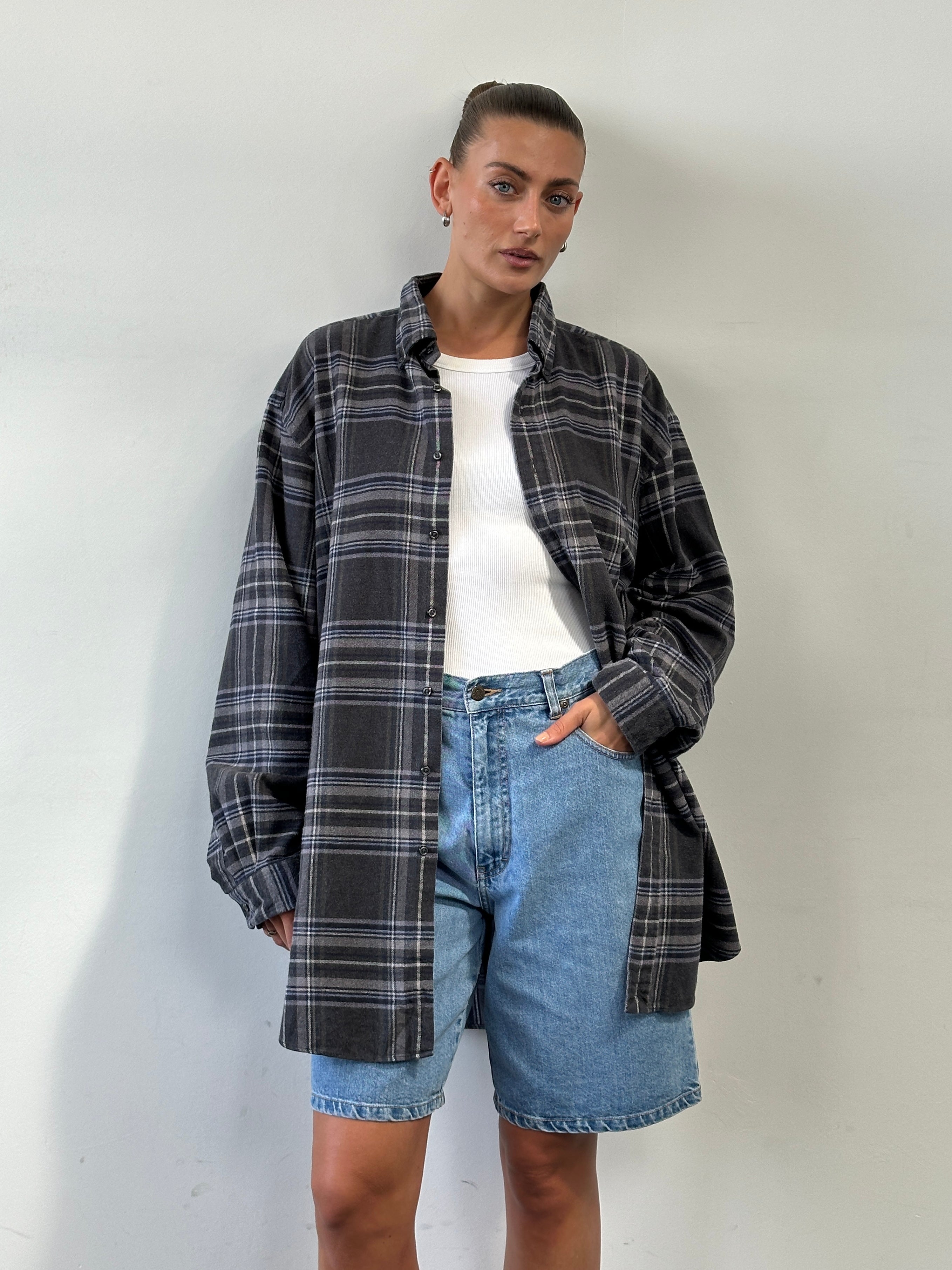 Ralph Lauren XXL pure cotton flannel logo shirt featuring a plaid pattern and classic collar, laid flat for display.