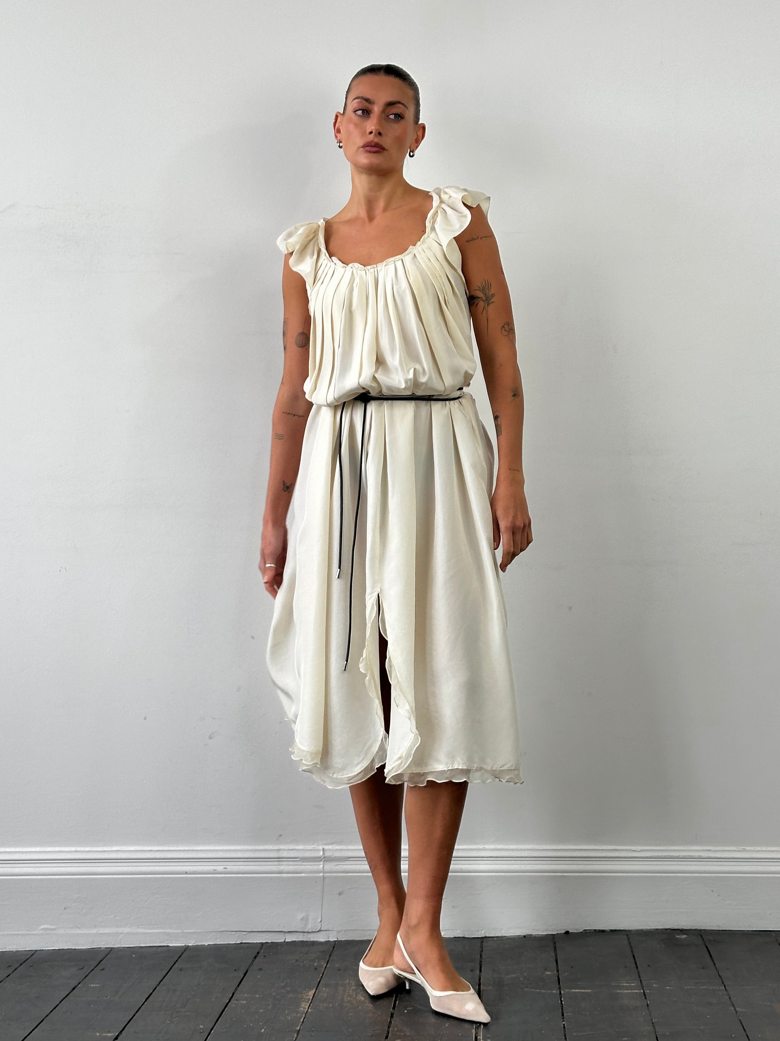 Prada 2012 pure silk pleated slip dress in size large, featuring elegant draped fabric and a sleek, sophisticated silhouette.