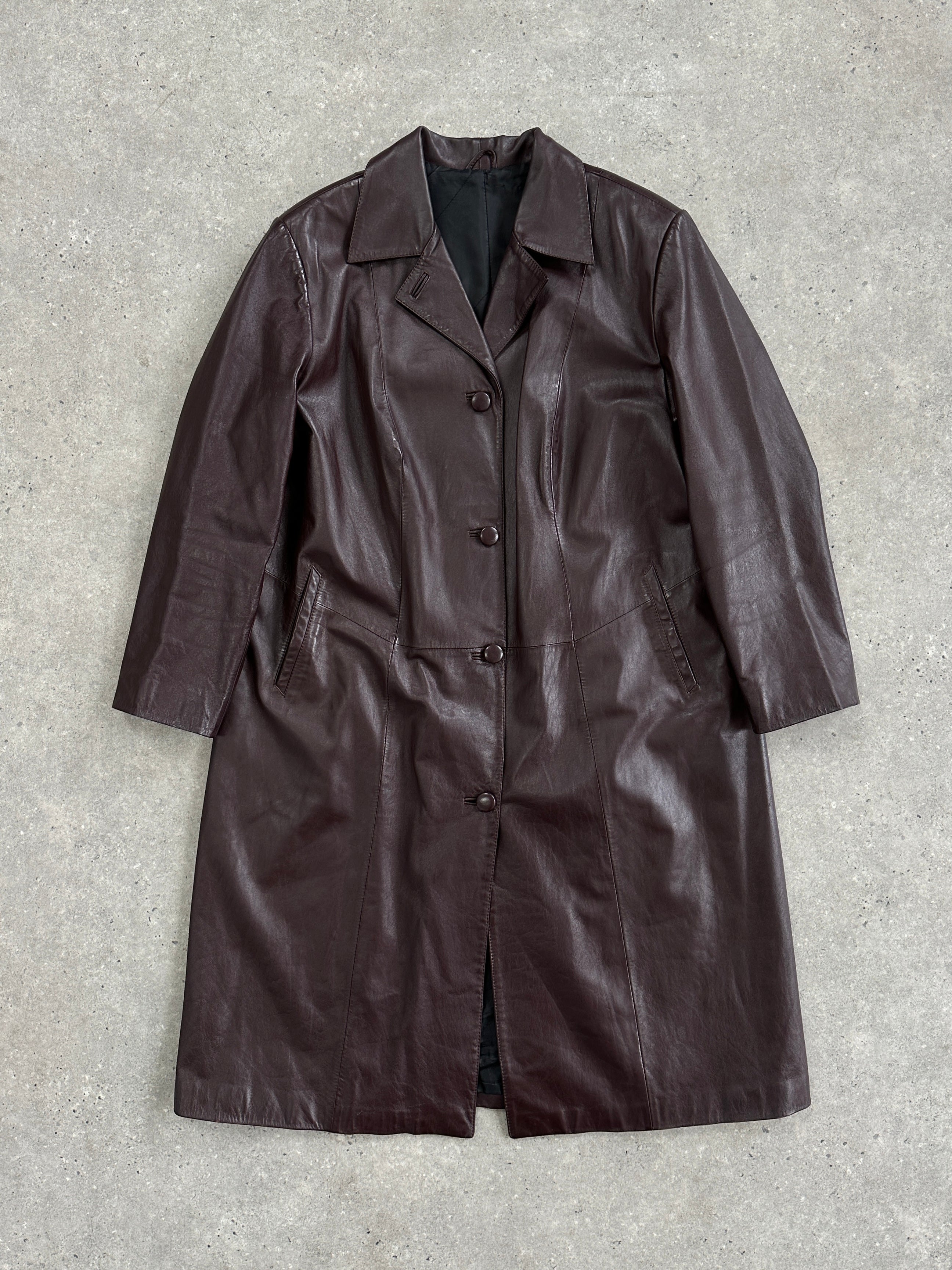 Vintage leather trench coat jacket in size L, featuring classic design and aged leather finish.