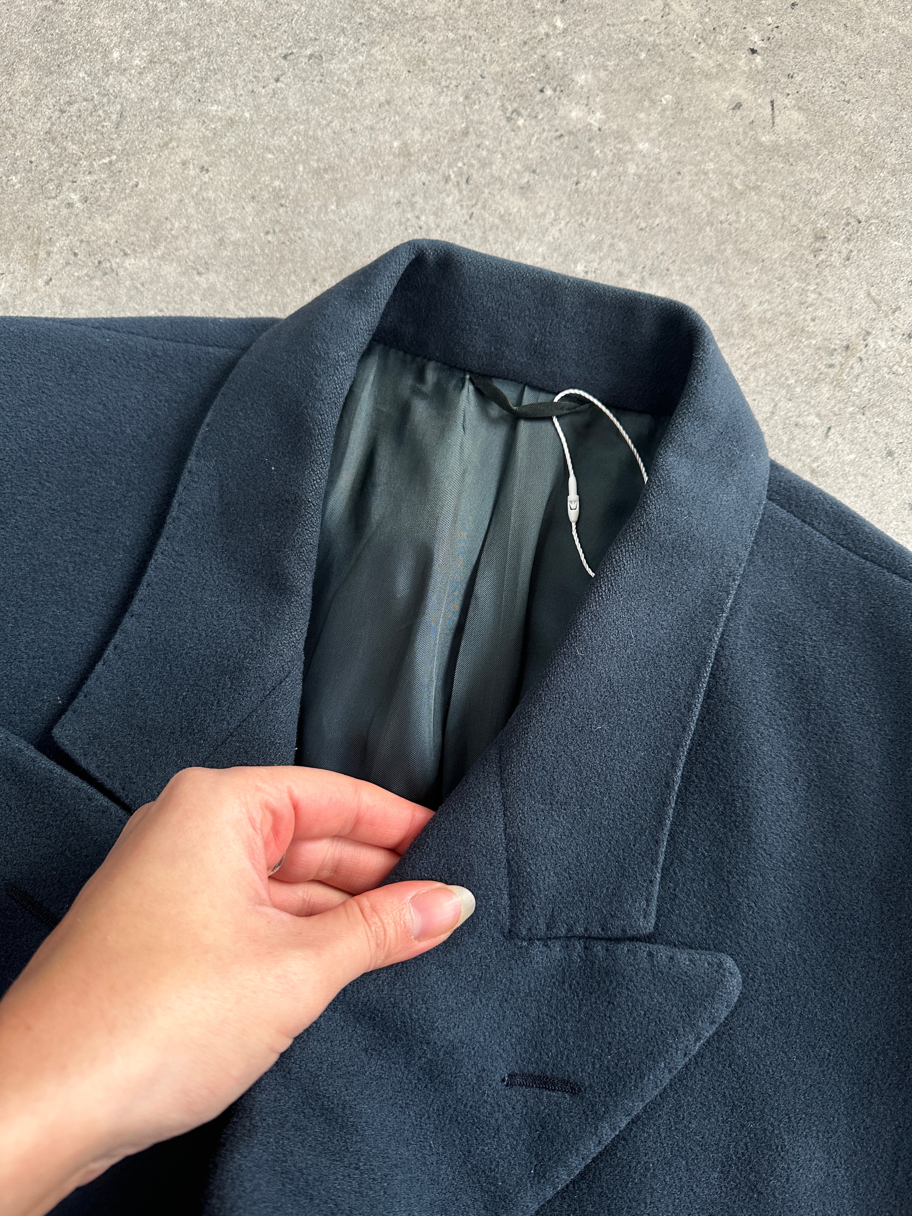 Moschino 1990s pure wool double-breasted coat in XL/XXL, featuring classic design and tailored fit in neutral color.