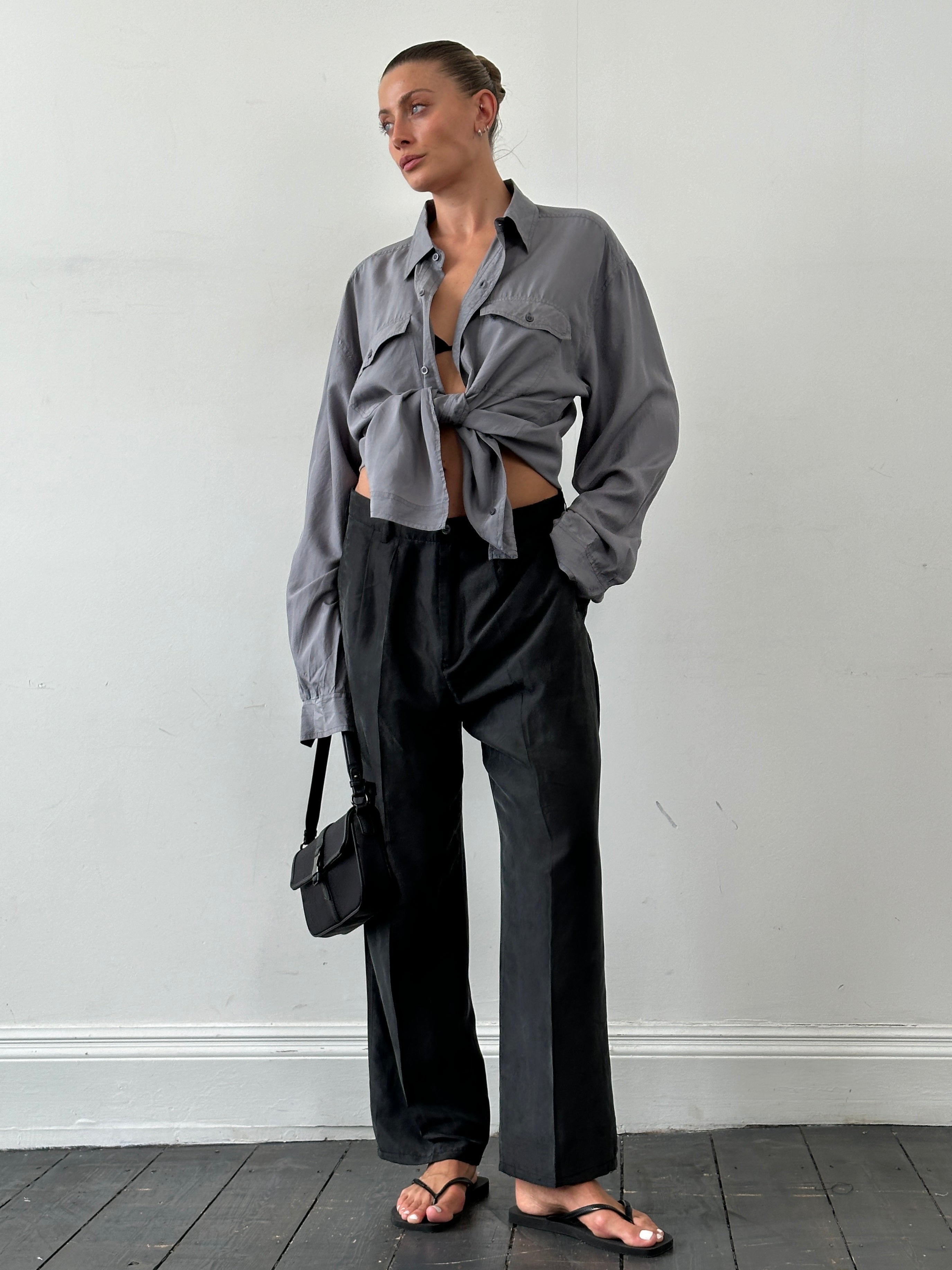 Vintage pure silk high-waisted straight leg trousers in W32, showcasing elegant fit and smooth fabric.