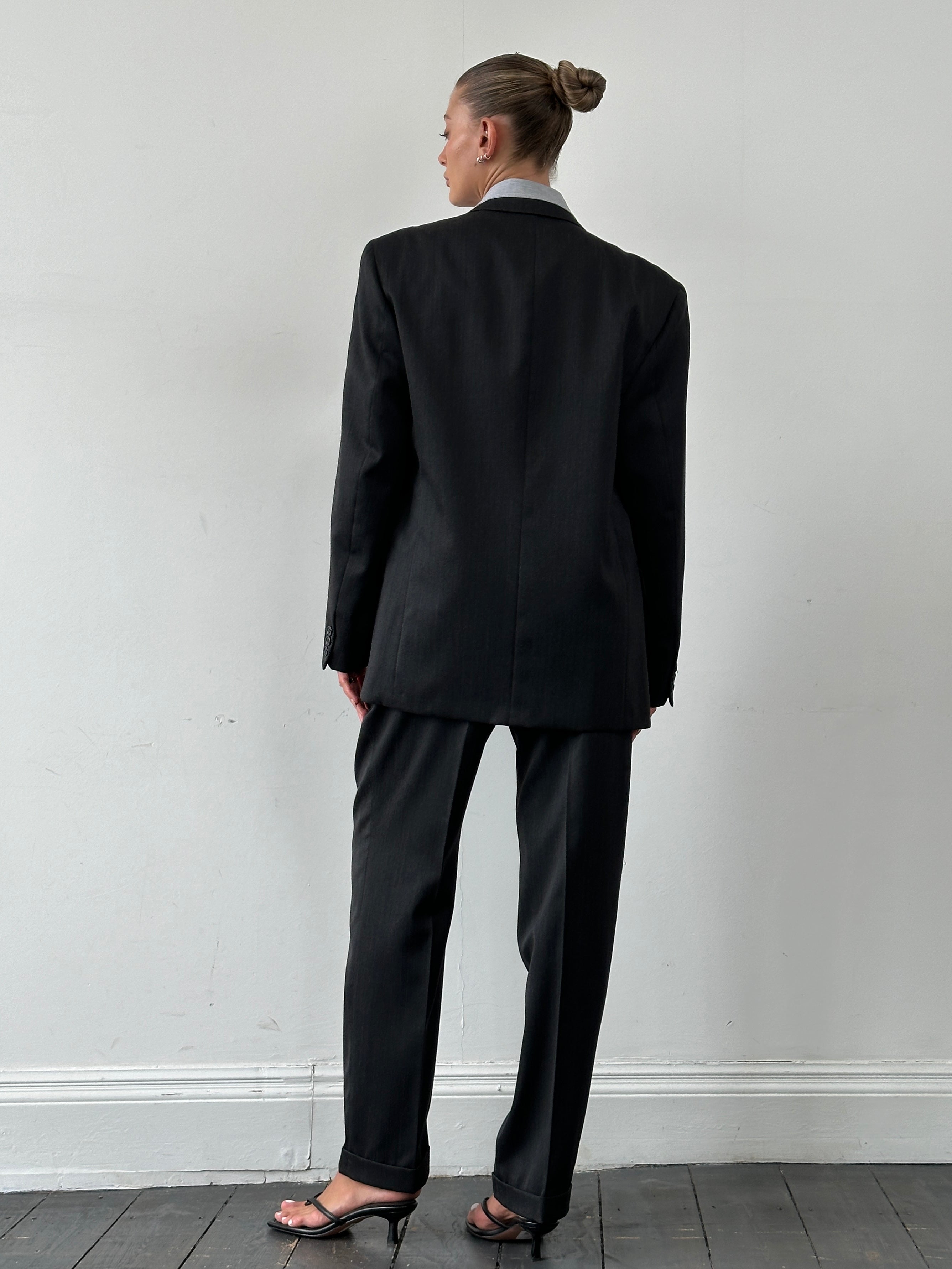 Vintage wool pinstripe single-breasted suit jumpsuit in size 40R/W32, featuring classic tailored design and vintage style.