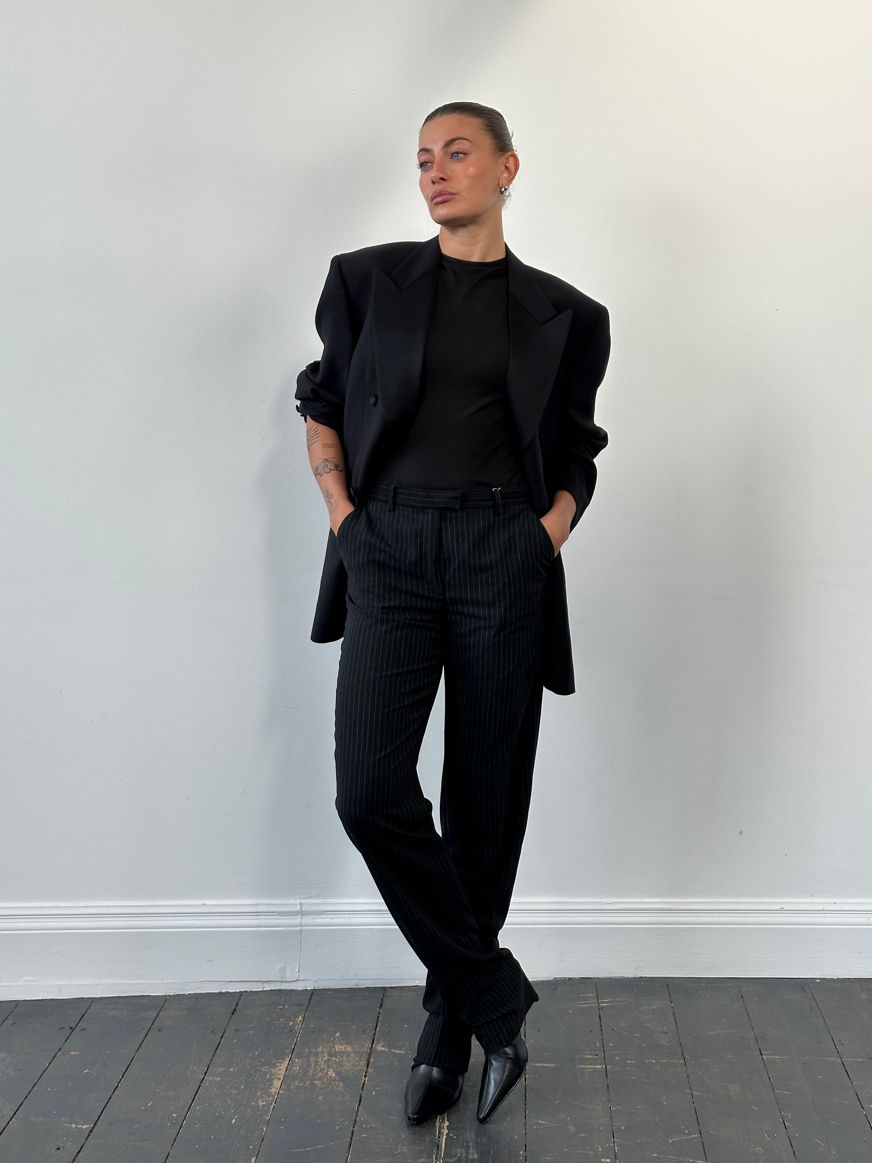 Armani Collezioni 2000s pure wool tailored trousers with straight leg fit, in size W28, shown on a neutral background.
