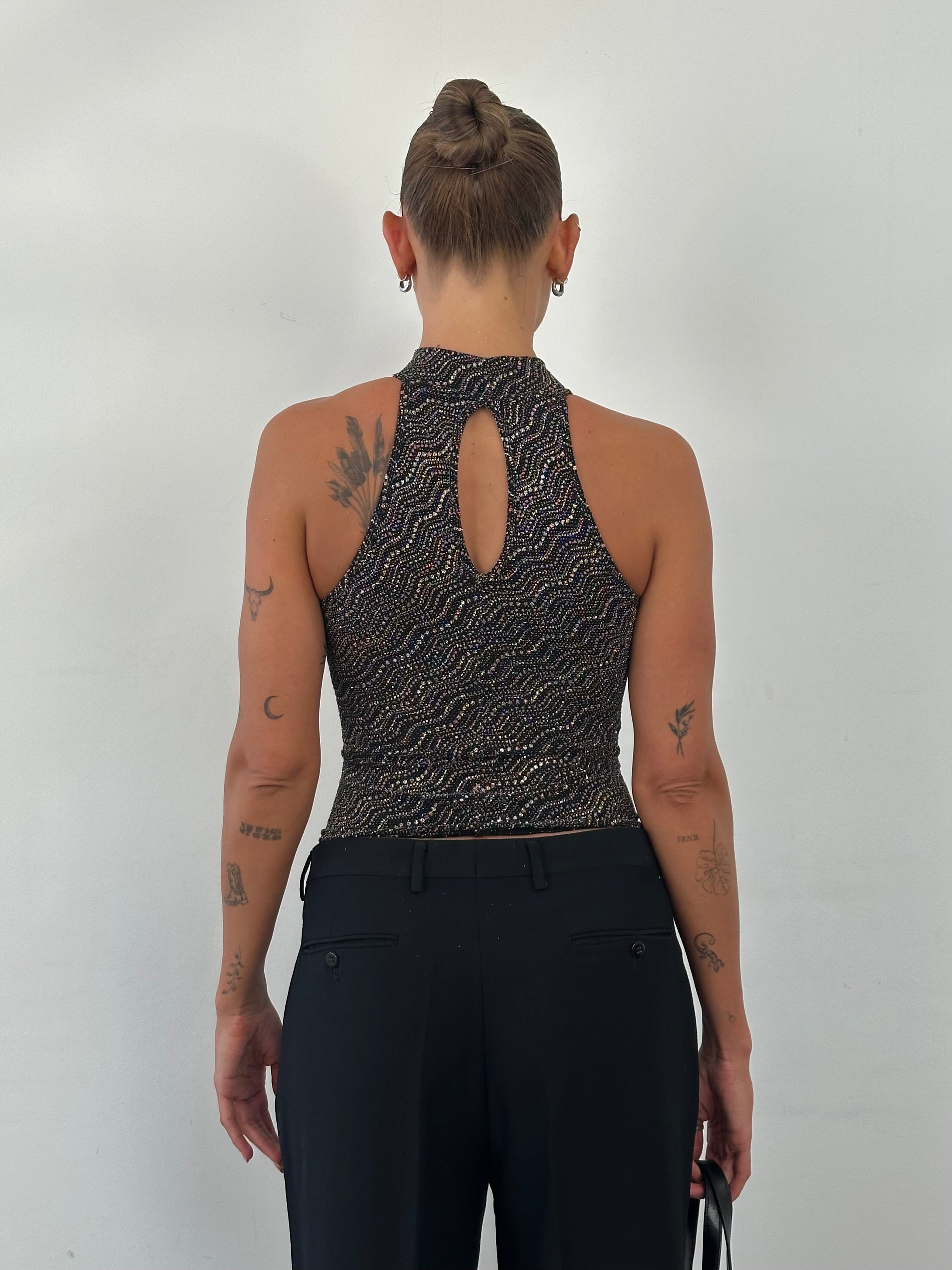 Vintage French sleeveless glittery high-neck tank top in size S, stylish and shimmering sleeveless top for a chic look.
