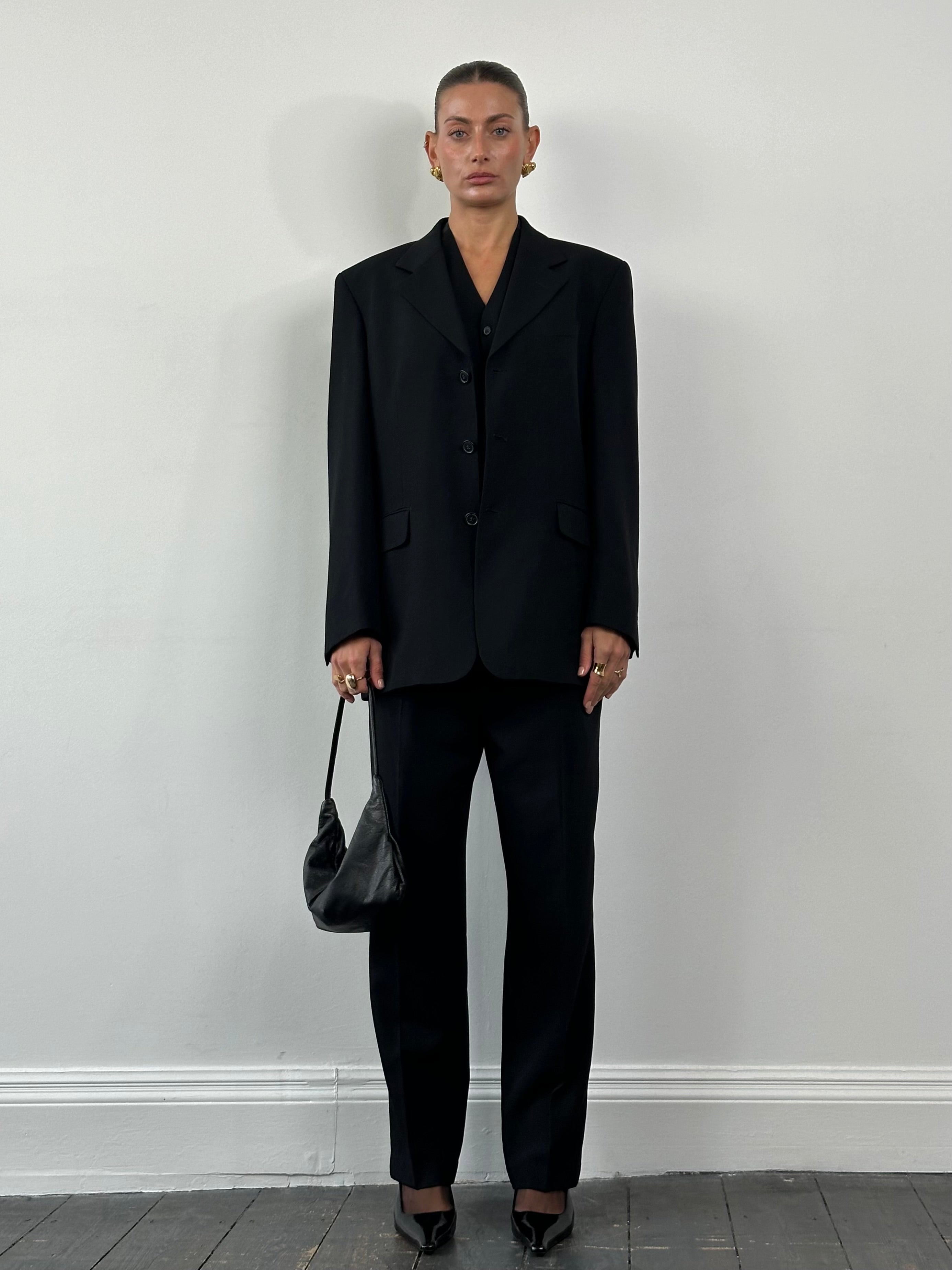 Yves Saint Laurent men's 1990s pure wool three-piece suit in size 40R/W32, displayed on a mannequin.