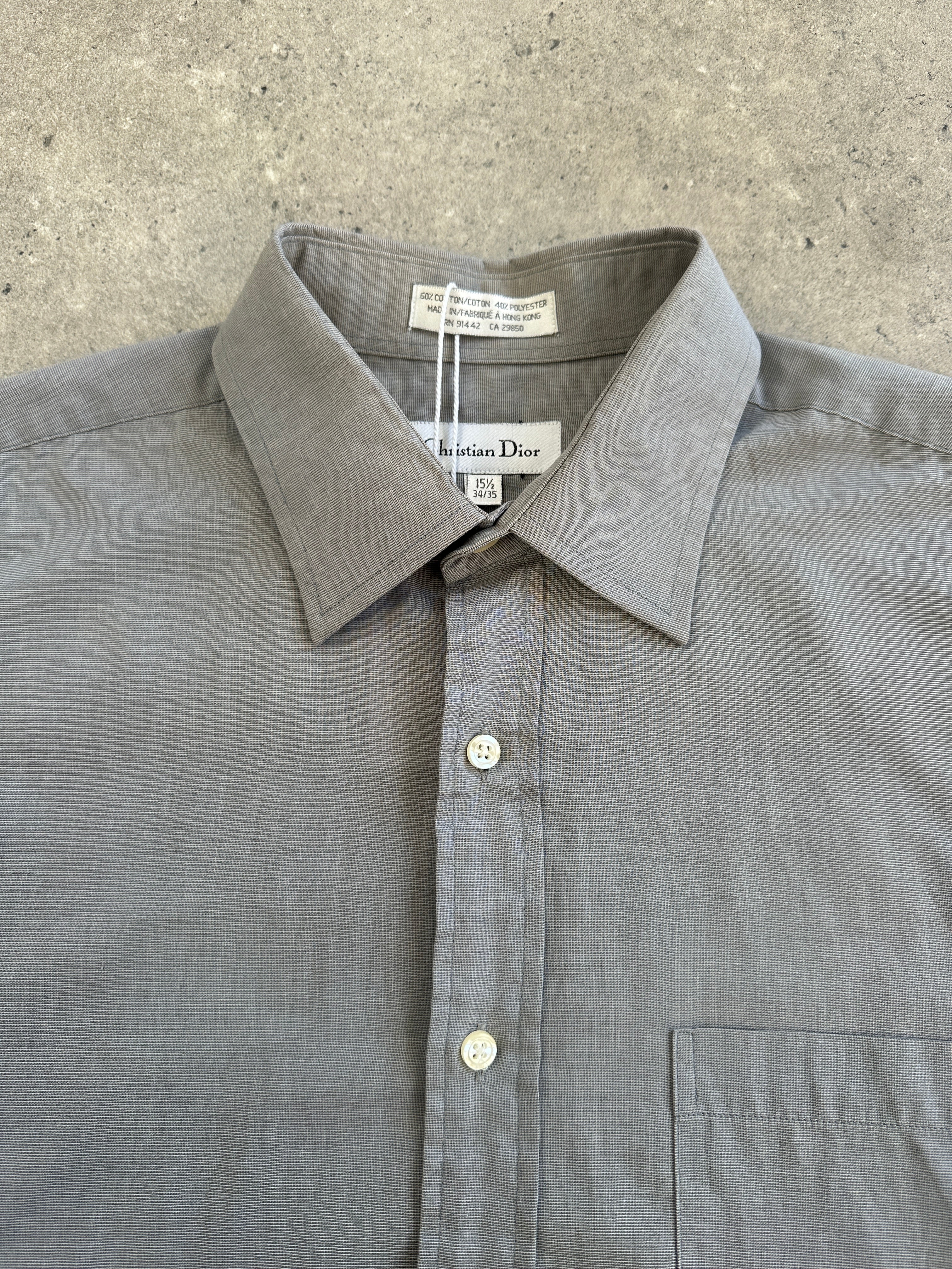 Christian Dior 1980s cotton shirt in size L/XL, featuring classic design and tailored fit, displayed on a hanger.