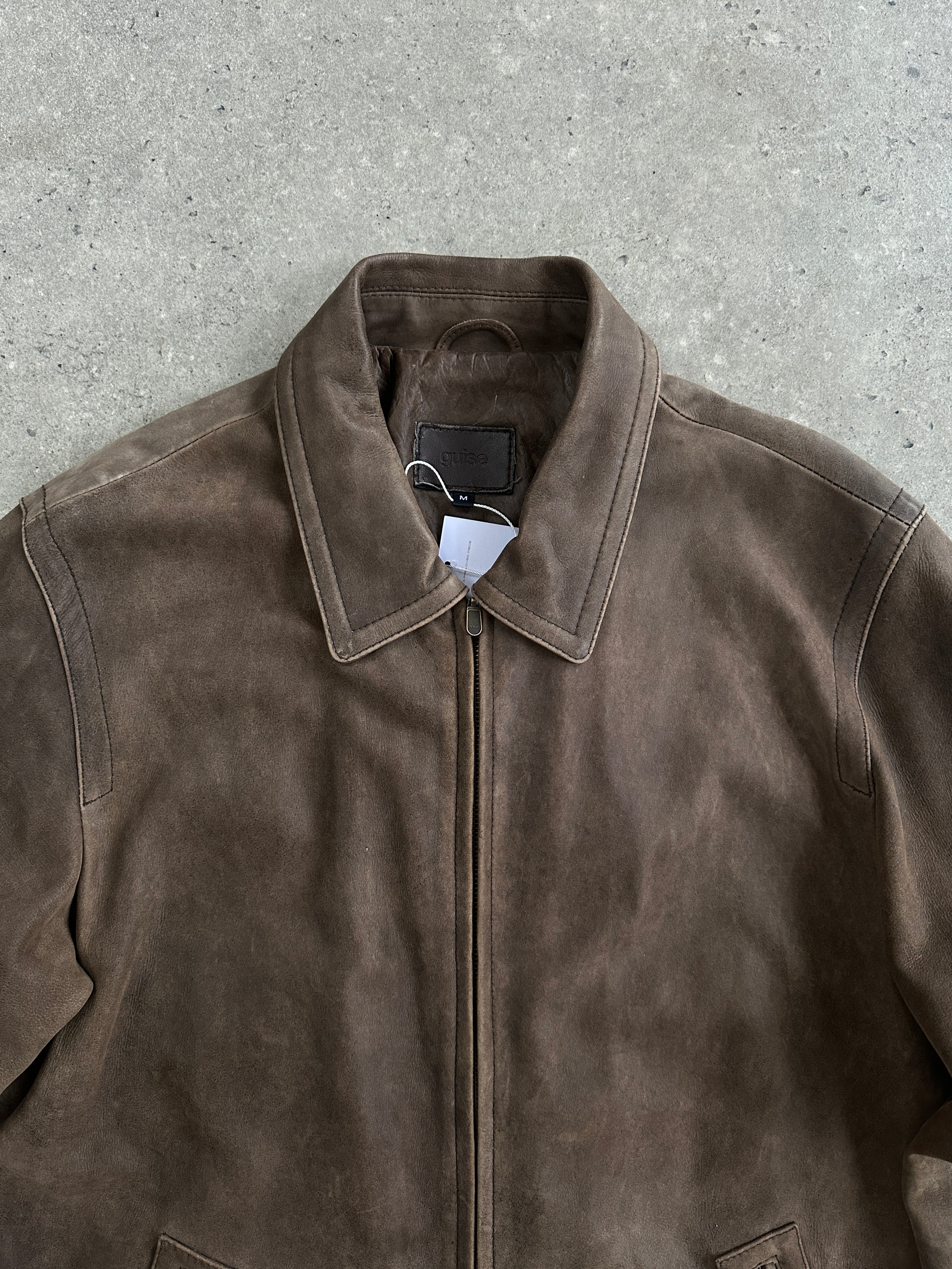 Vintage distressed leather jacket in size L, featuring rugged texture and classic design, by Vintage.