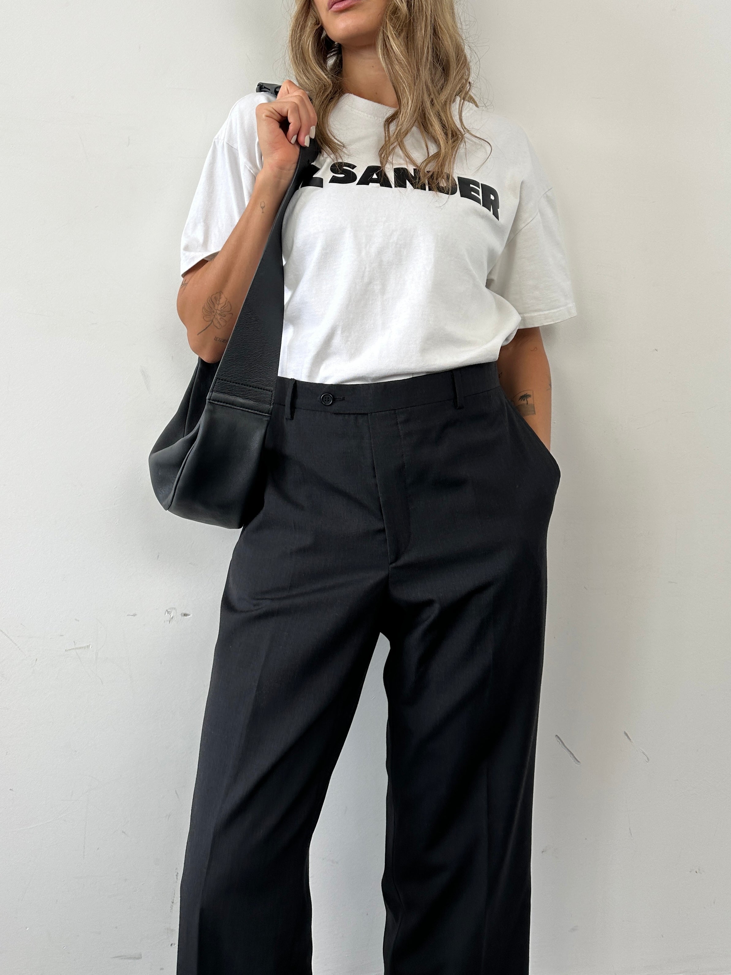 Vintage wool straight-leg tailored trousers in size W34, featuring classic design and neutral color, ideal for sophisticated style.