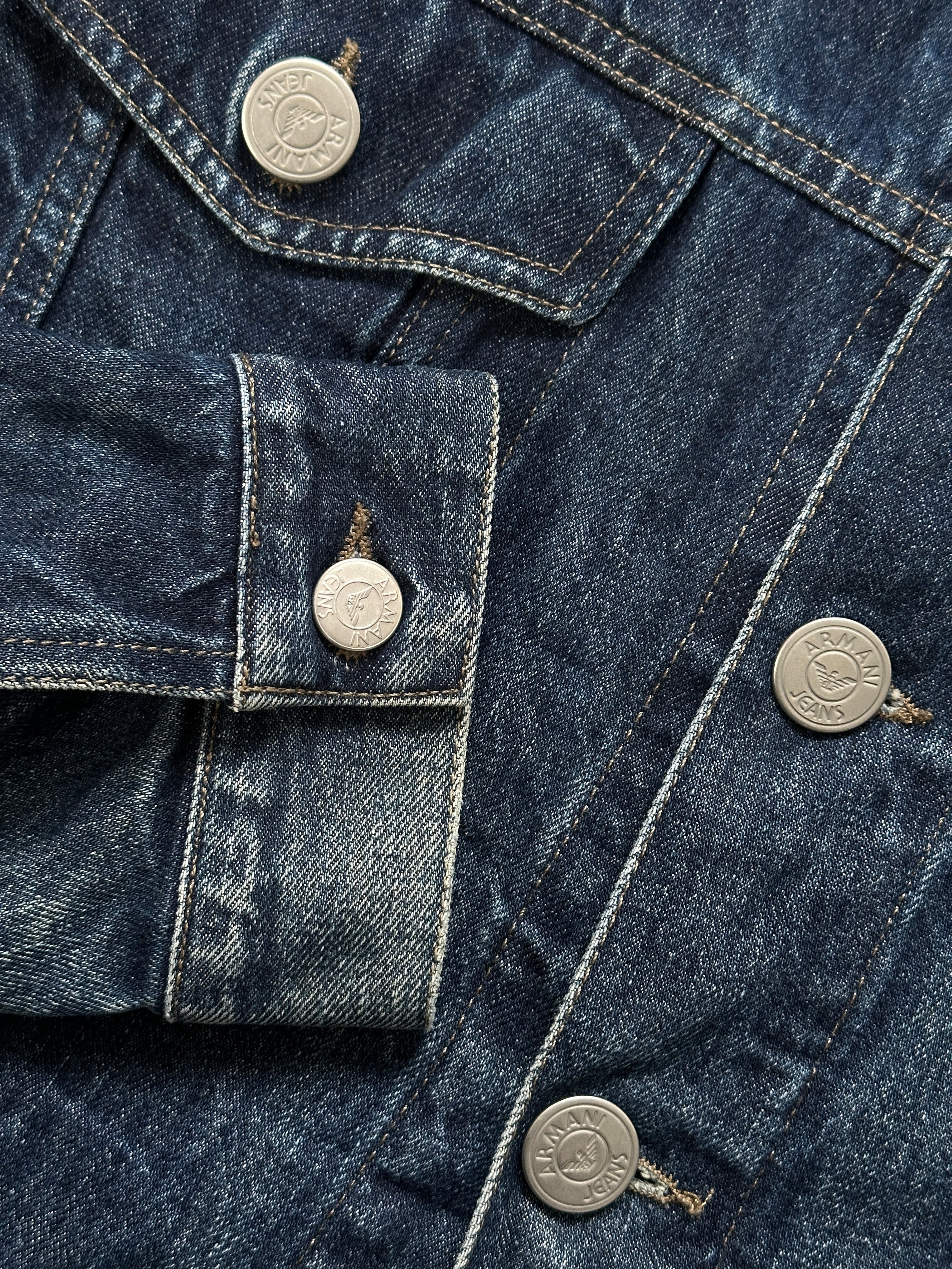 Armani Jeans 1900s mid wash denim jacket in size L, featuring classic style, button front, and chest pockets.