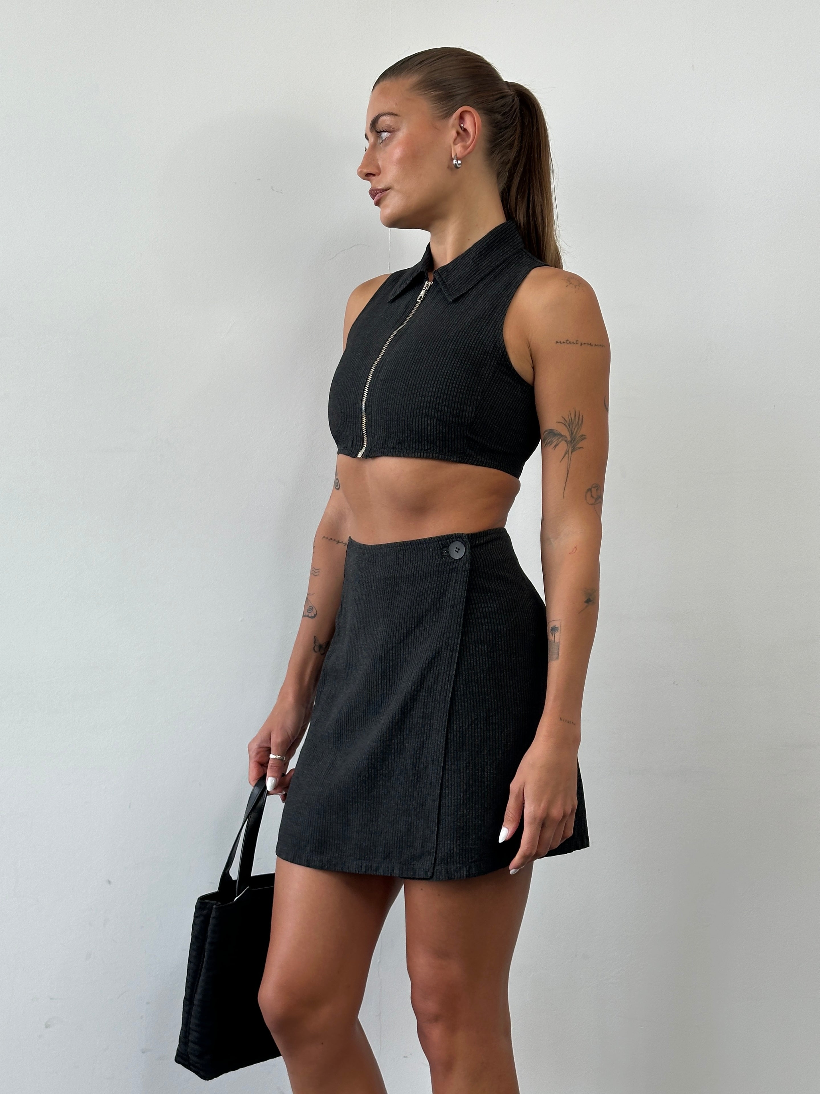 Armani Jeans linen stripe two-piece skirt set with a matching skirt and top, styled in a light, breathable fabric.