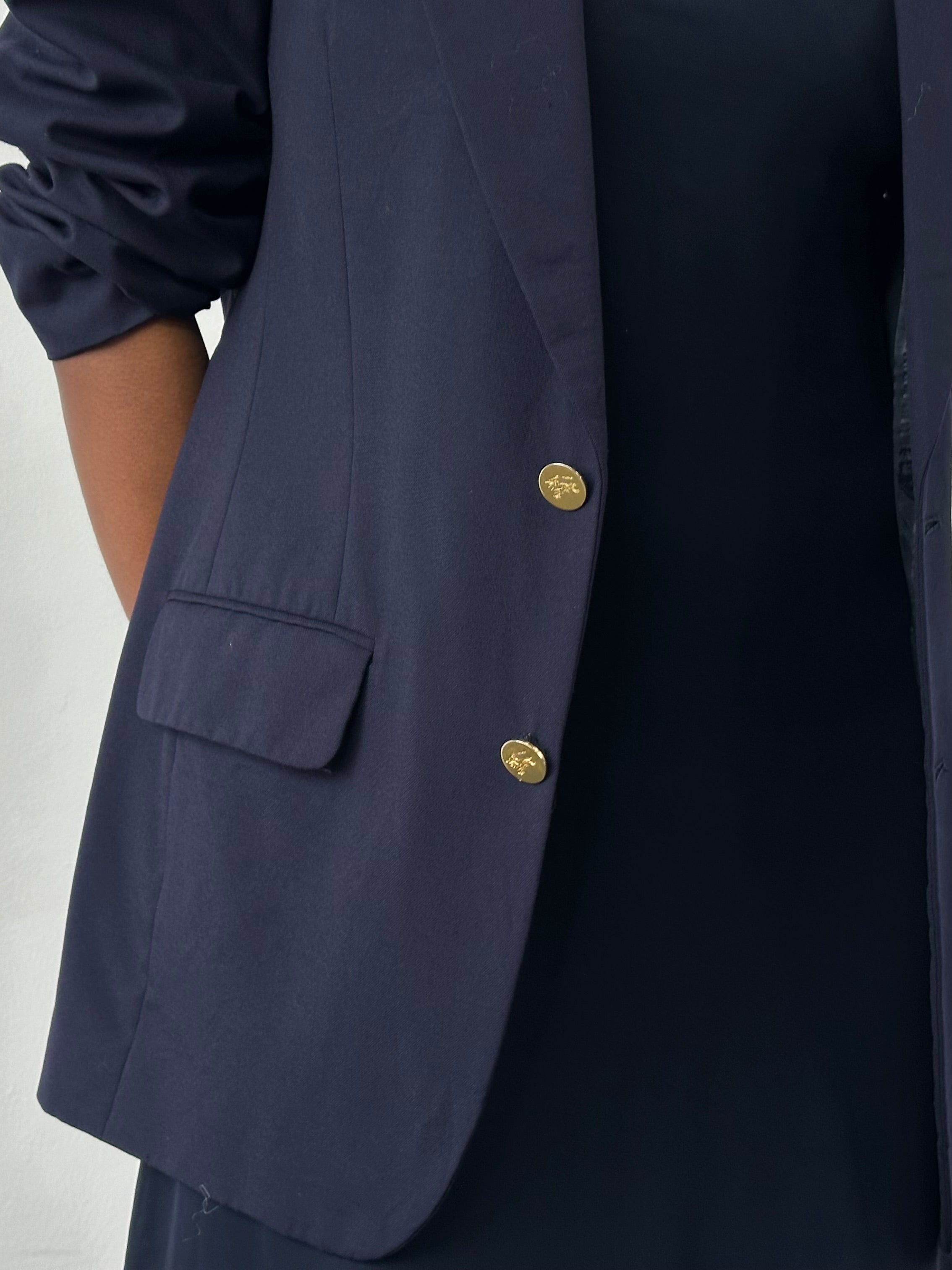 Burberry 1980s bespoke pure wool blazer in size 38R/M, tailored fit with classic button closure and tailored lapels.