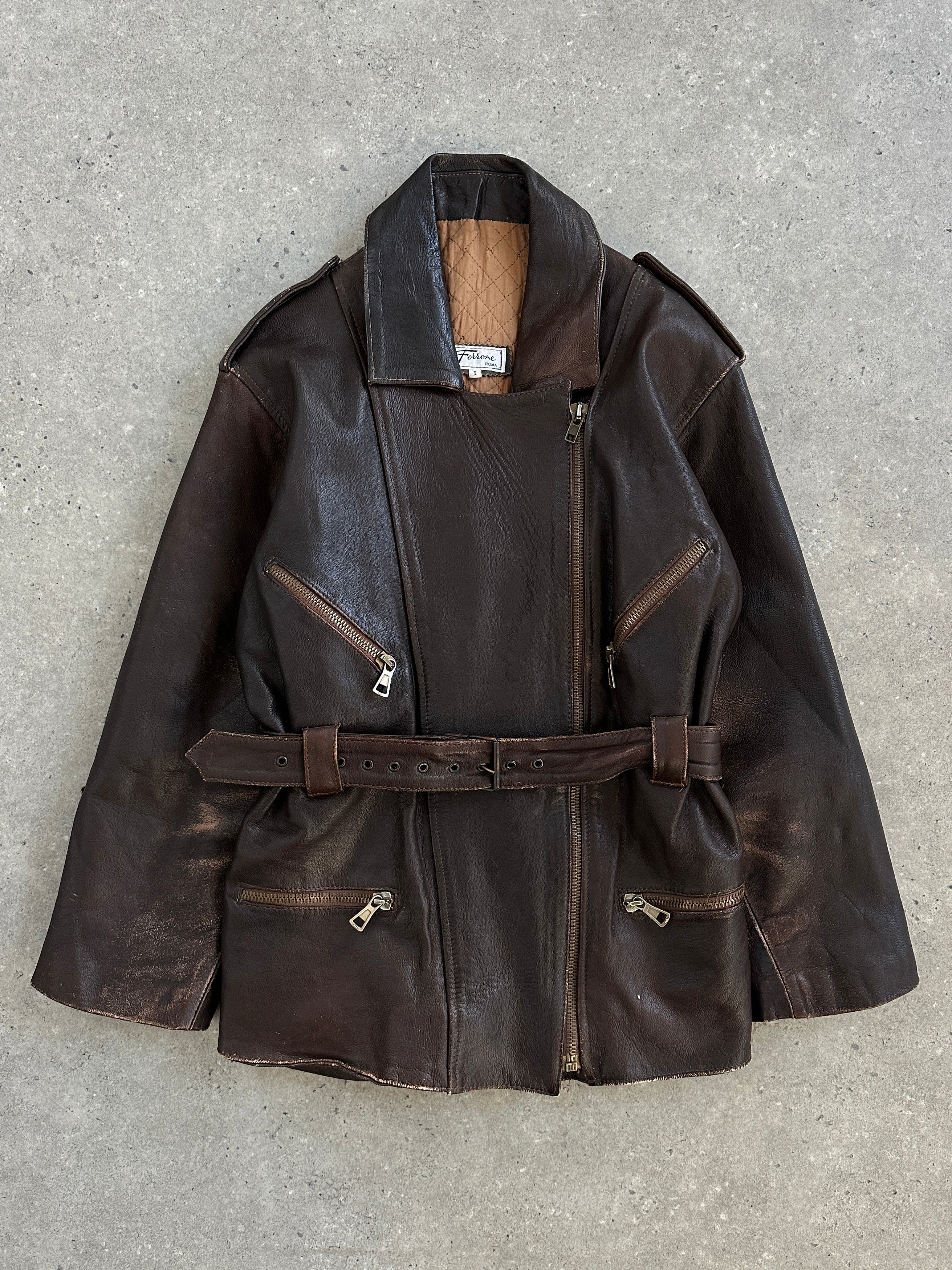 Vintage Italian 1990s belted leather jacket, medium size, aged brown leather with classic design and vintage detailing.