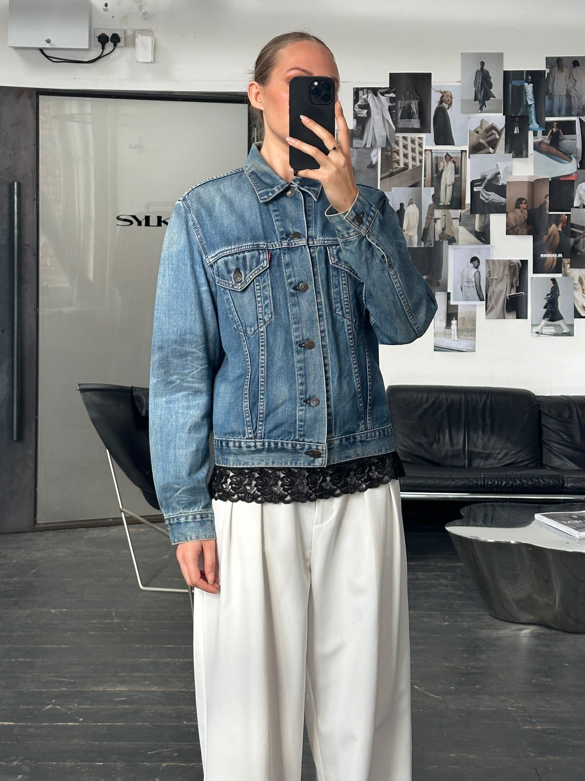 Levi’s 1990s faded denim jacket, men's size M, with classic button closure and vintage washed look.