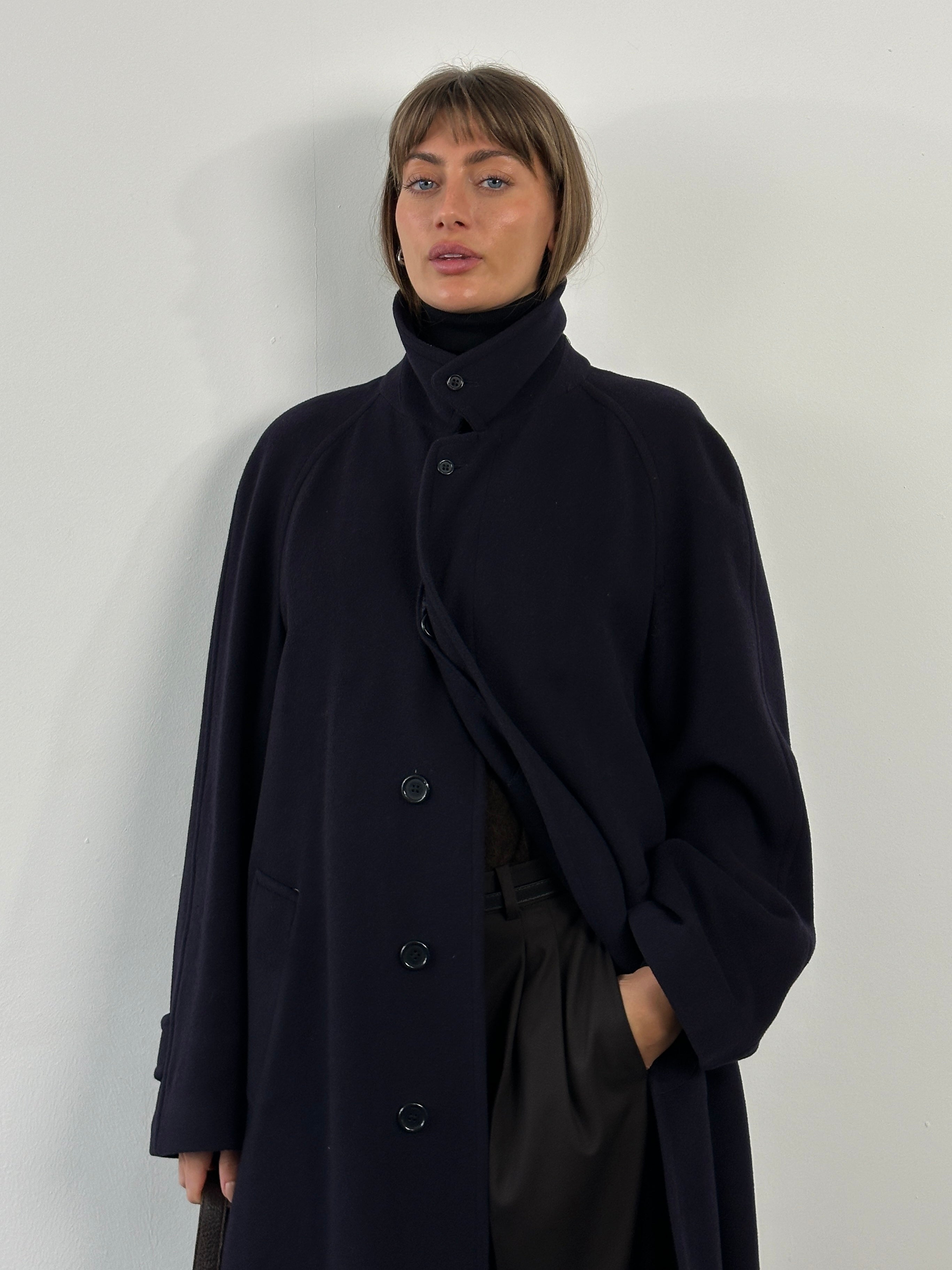 Elegant Jaeger 1990s high neck pure cashmere coat in XL, showcasing a classic tailored design with a high collar and soft fabric.